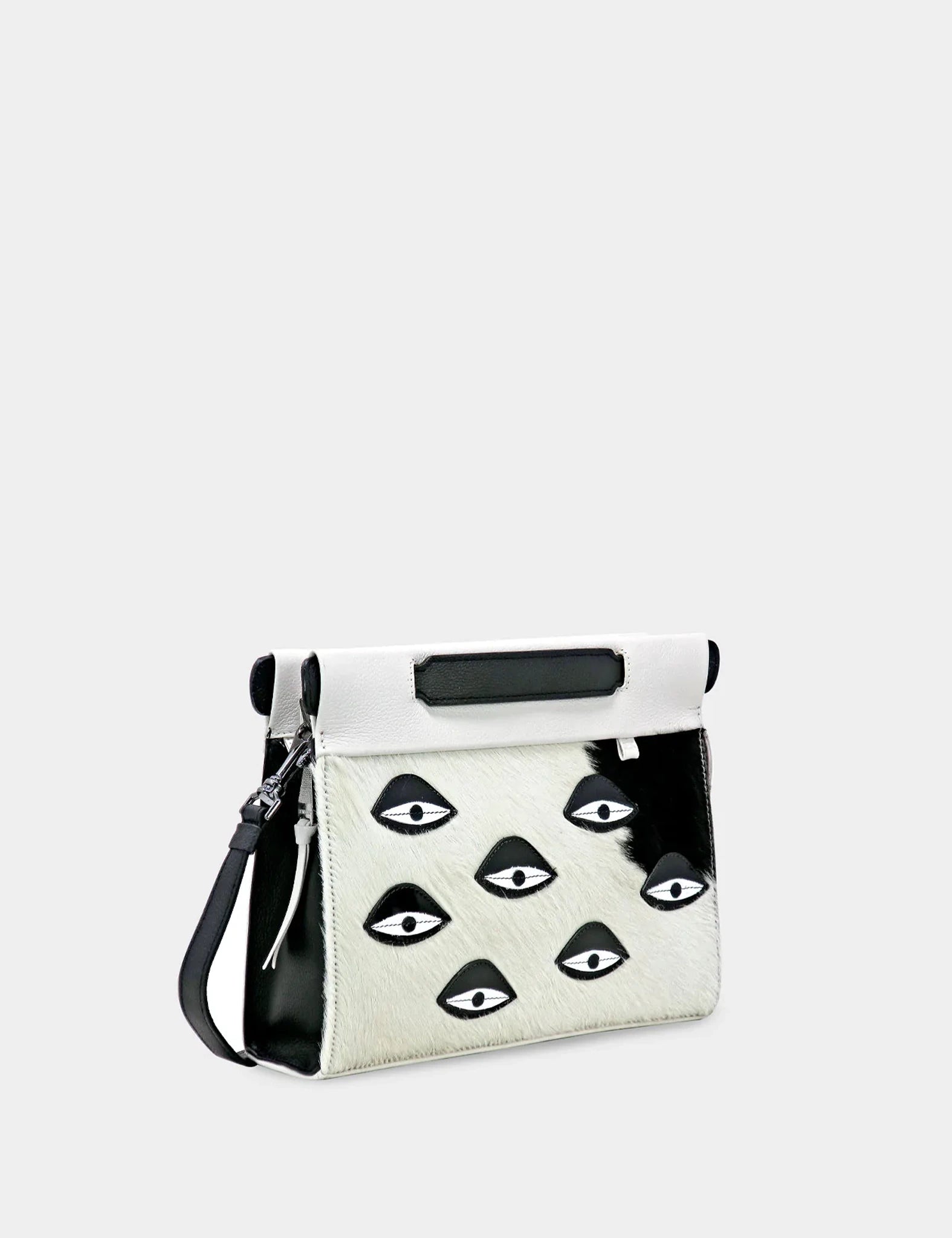 Vali Crossbody Small Cream Leather Bag - Eyes Applique Adjustable Handle - Front corner angle view