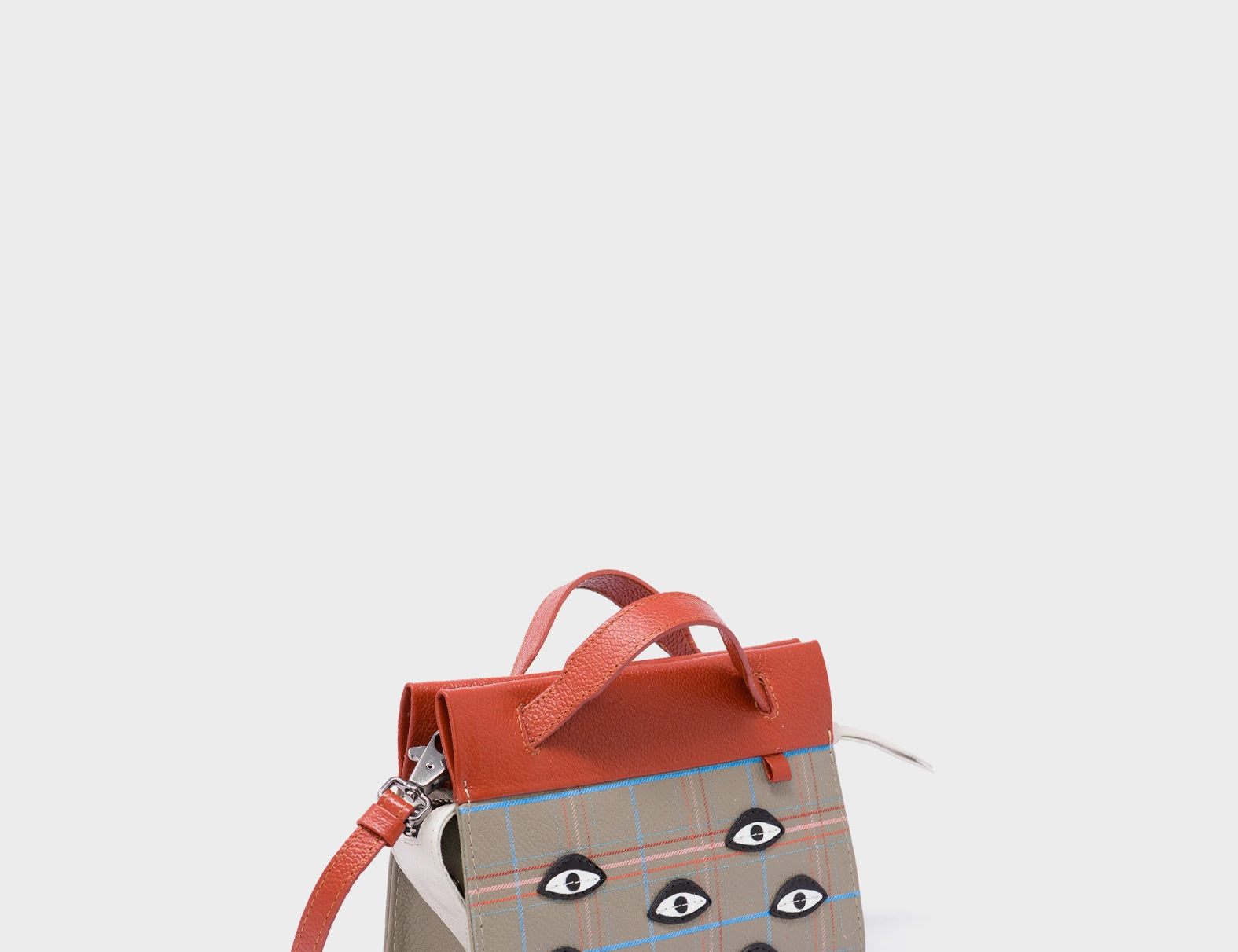 Vali Crossbody Micro Tuffet Brown Leather Bag - Eyes Applique Adjustable Handle - Handles View