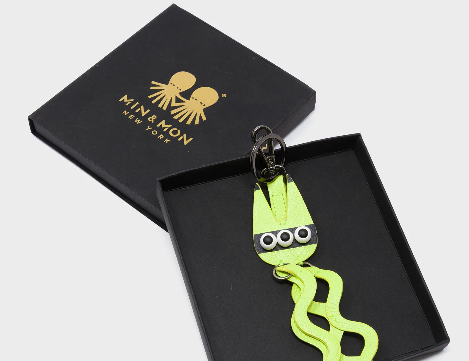 Cosmic Cat Charm - Sharp Green Leather Keychain - Package
