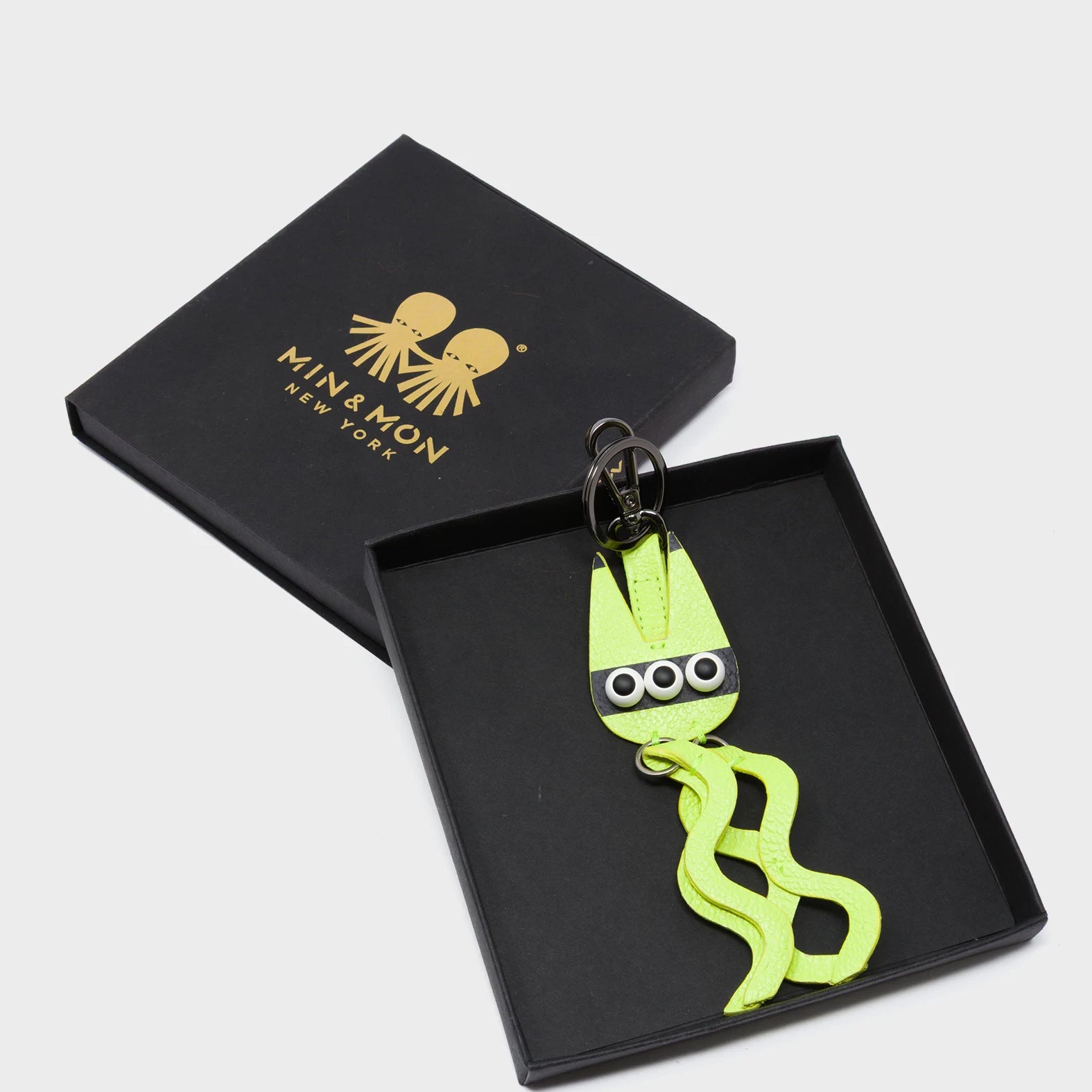Cosmic Cat Charm - Sharp Green Leather Keychain - Package