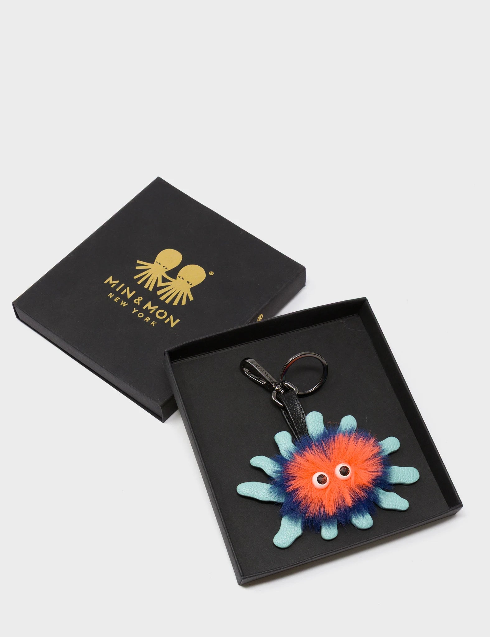 Velvoria Charm - Eggshell Blue Leather Keychain - package