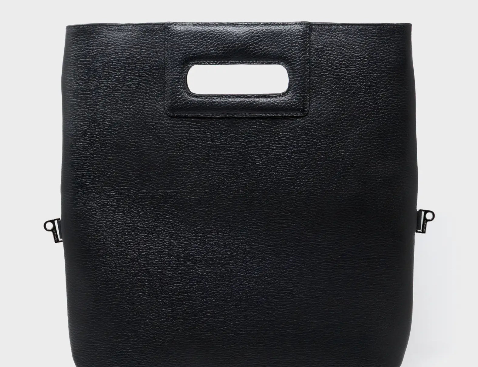 Milo Convertible Crossbody Bag - Black Leather Creatures of the Future Print - Back View