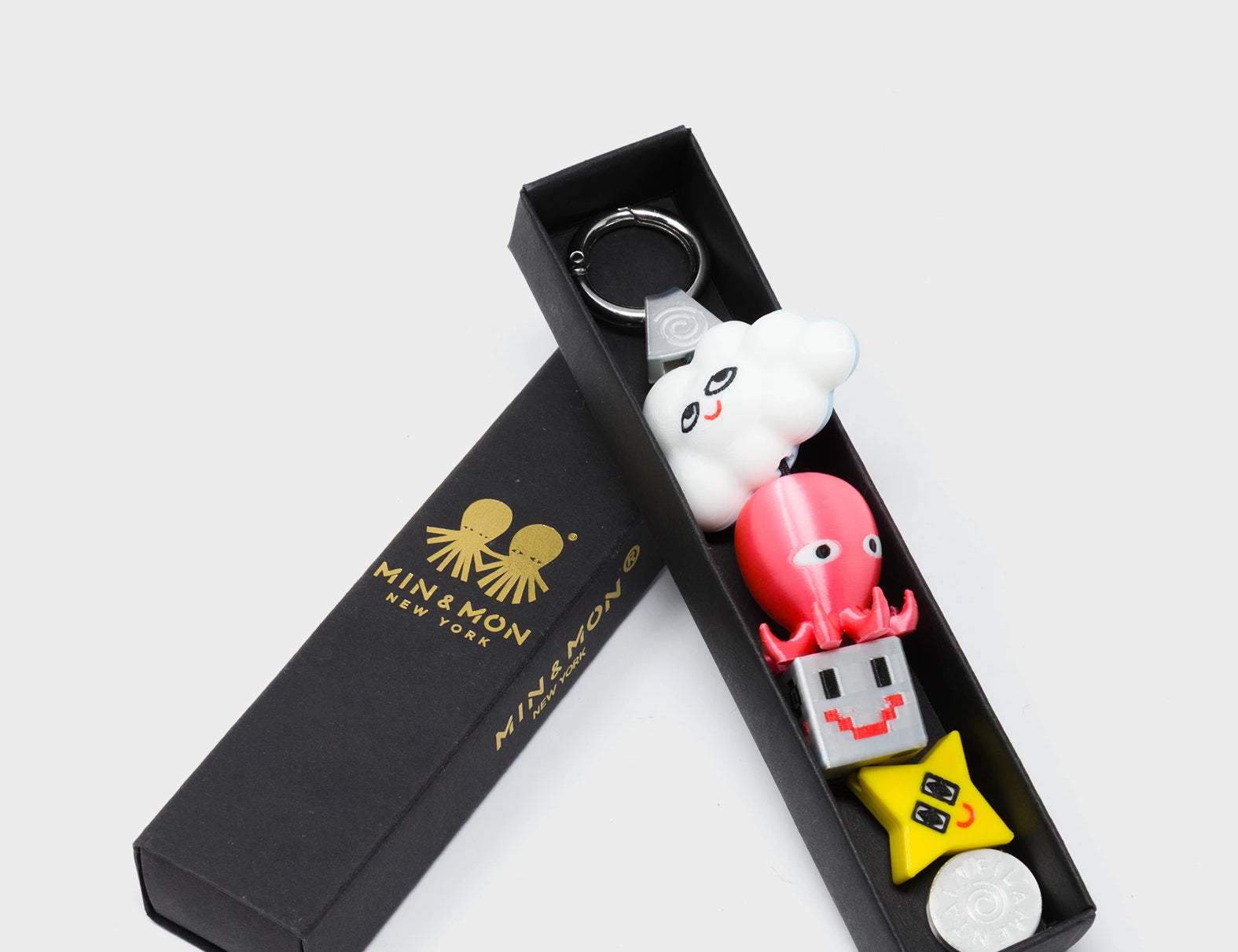 Octodazzle Charm - Fucshia and Yellow 3D Printed Bioplastic Keychain - Package