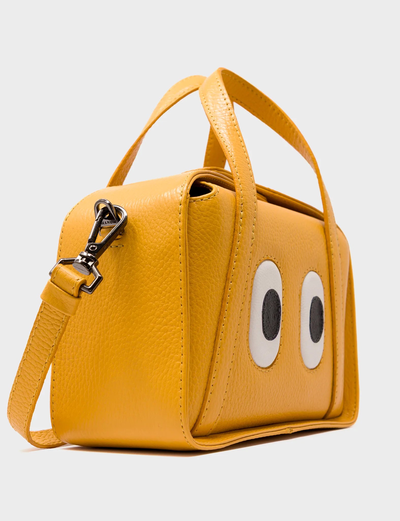 Benji Small Crossbody Golden Glow Leather Bag - Eyes Engraved - Side Corner View