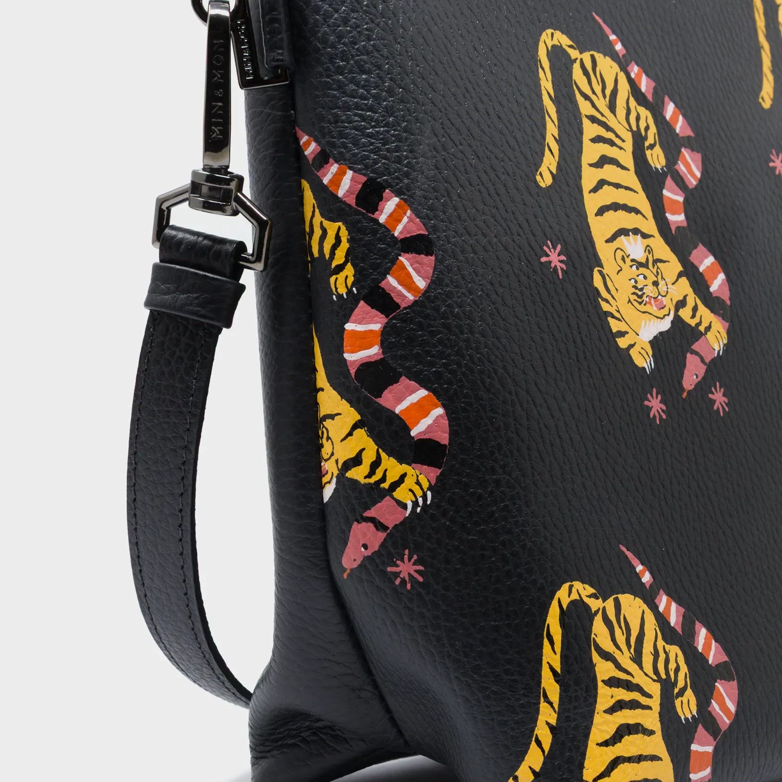 Milo Convertible Crossbody Bag - Black Leather Creatures of the Future Print - Detail View