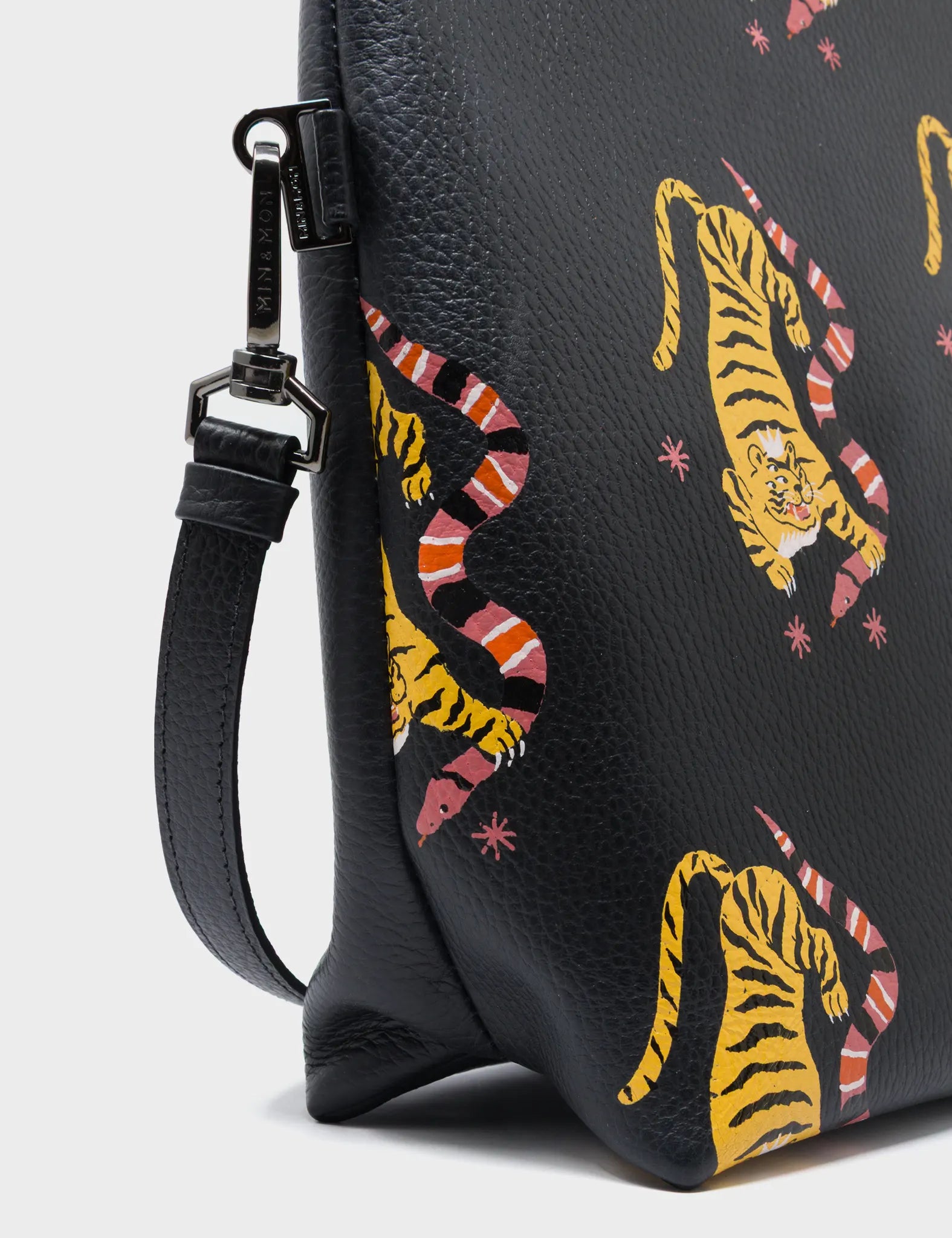 Milo Convertible Crossbody Bag - Black Leather Creatures of the Future Print - Detail View
