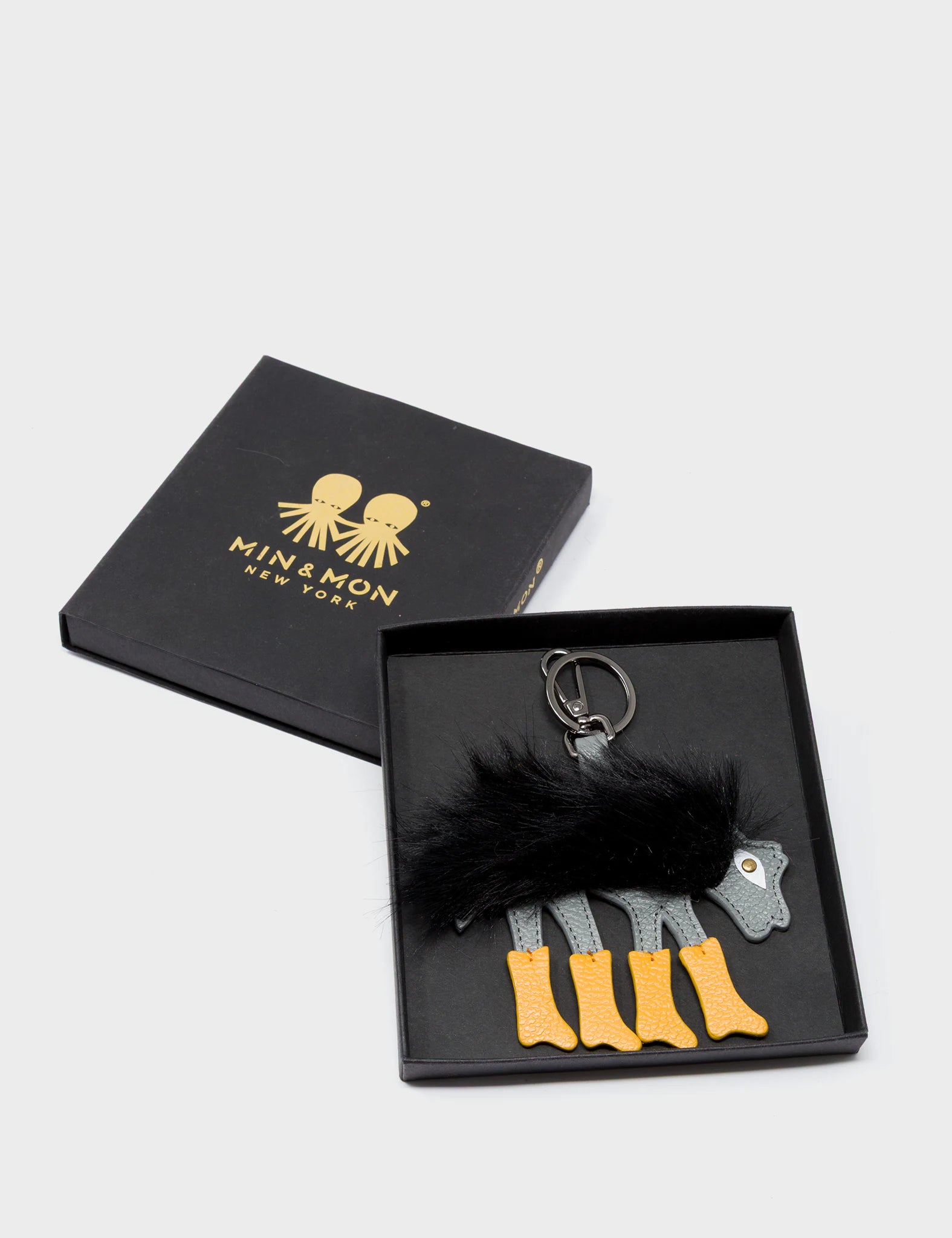 Wolf In Heels Charm - Black Faux Fur and Golden Glow Boots Keychain - Package