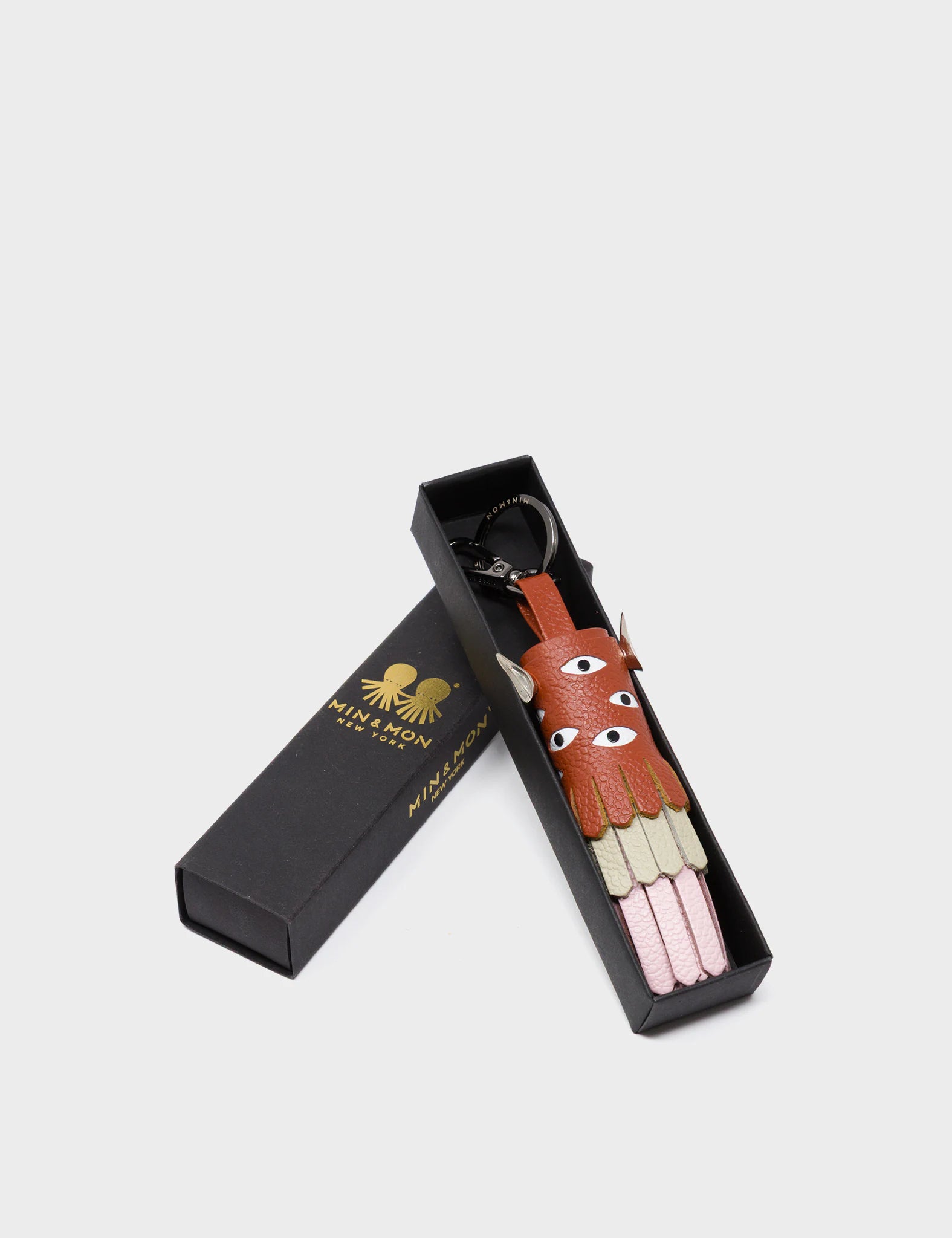 Oliver The Ox Charm - Baked City Brown Leather Keychain - package