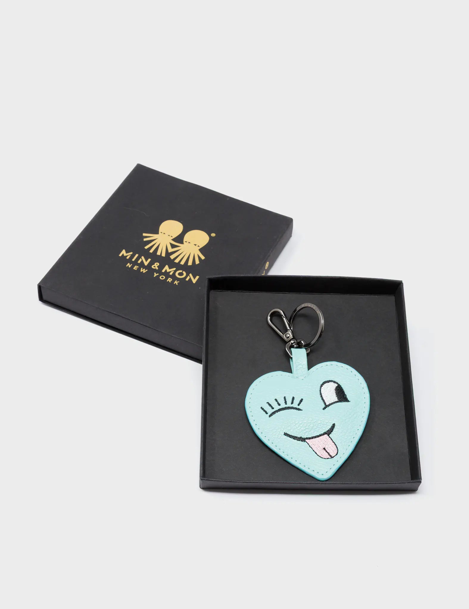 Hearty Smile Charm - Eggshell Blue Leather Keychain - Package