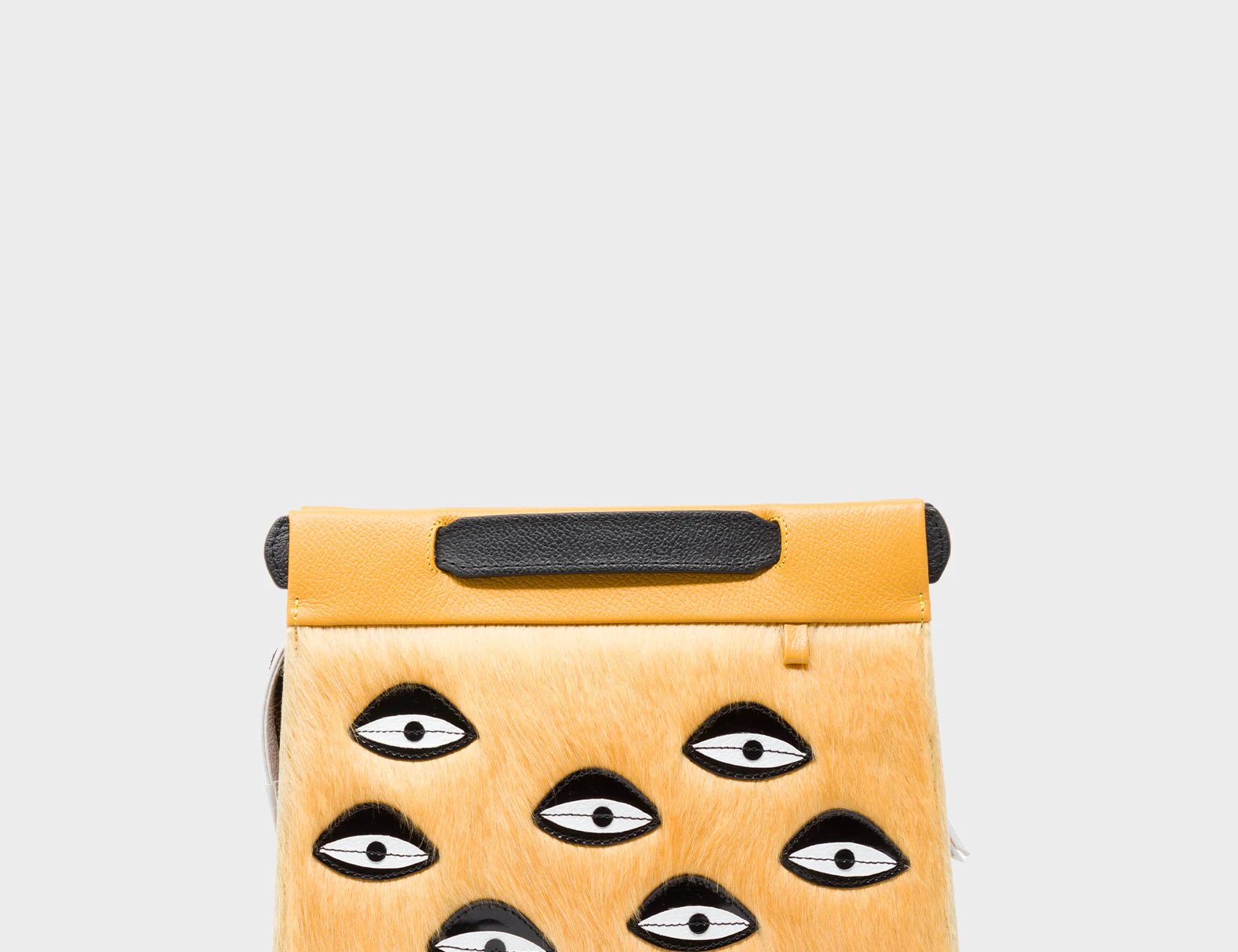 Vali Crossbody Small Golden And Black Leather Bag - Eyes Applique Adjustable Handle - Front View