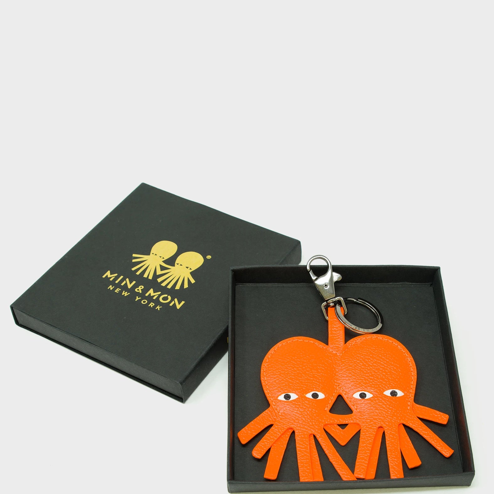 Octotwins Charm - Neon Orange Leather Keychain - Package