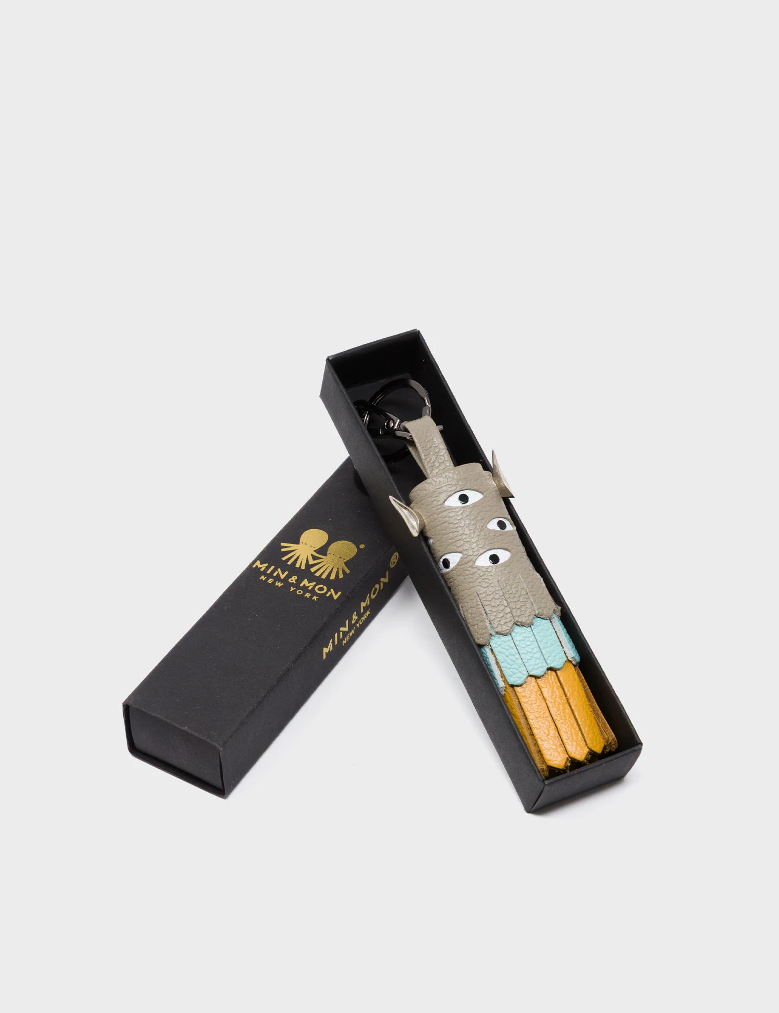 Oliver The Ox Charm - Tuffet Brown Leather Keychain - package