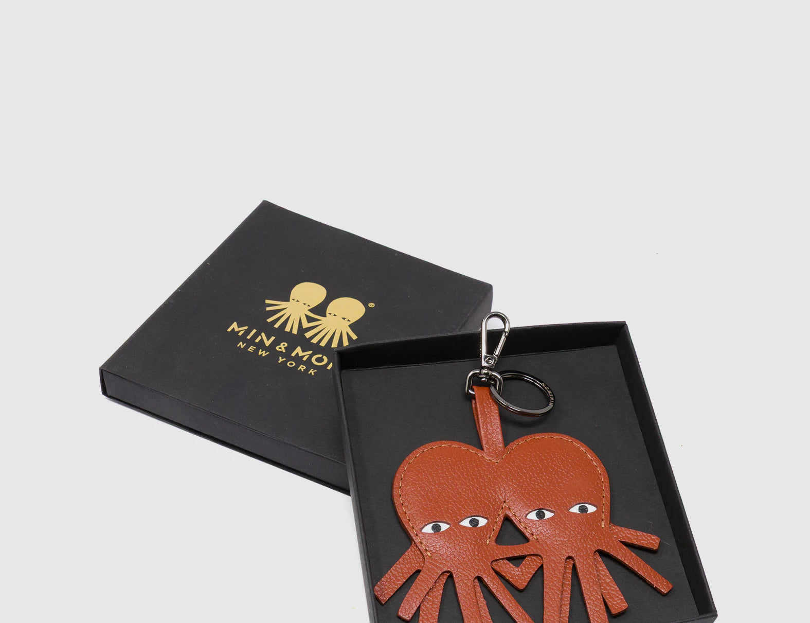Octotwins Charm - Baked City Brown Leather Keychain - package
