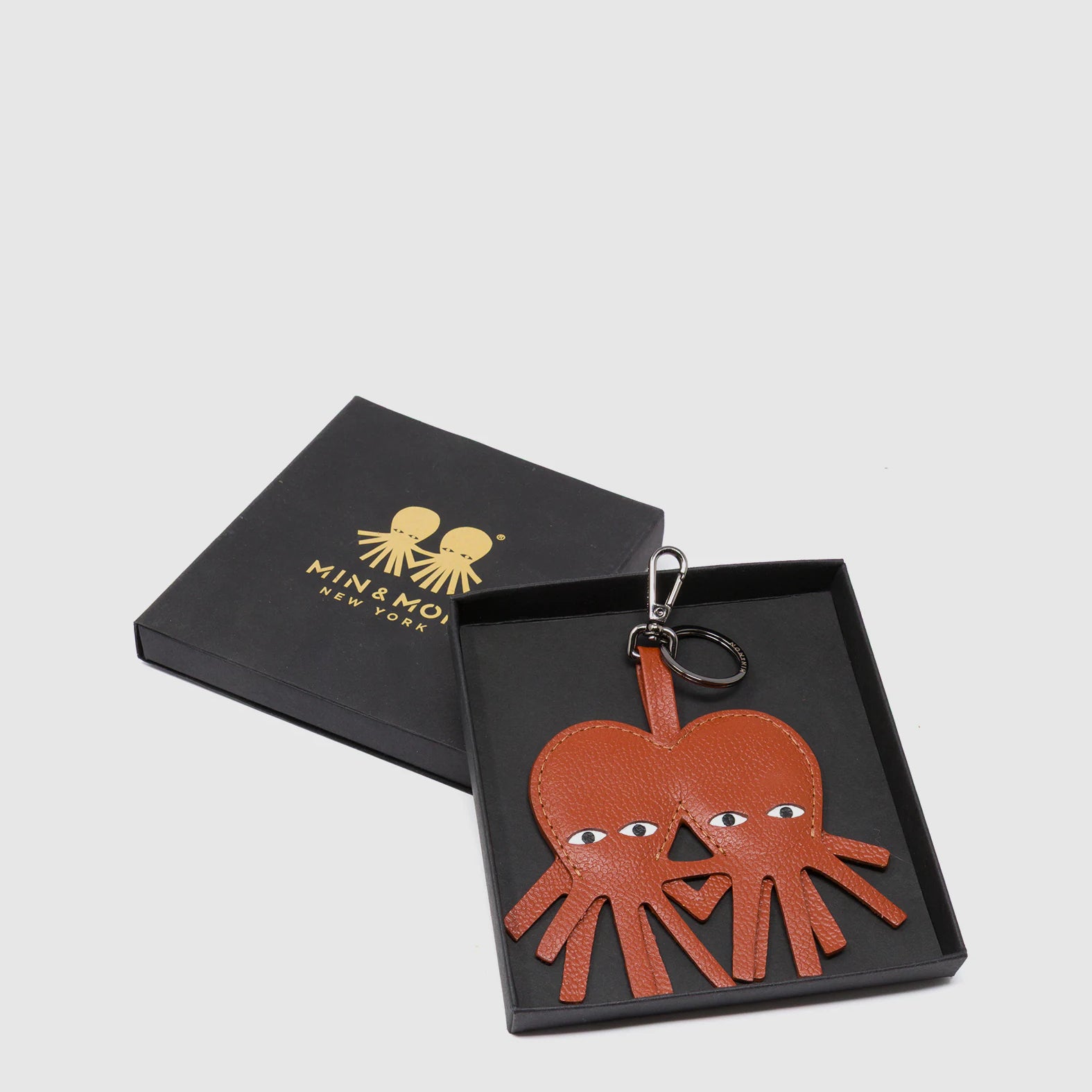 Octotwins Charm - Baked City Brown Leather Keychain - package