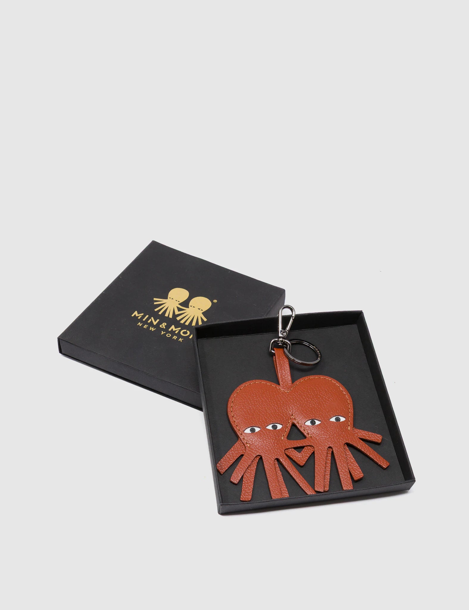 Octotwins Charm - Baked City Brown Leather Keychain - package