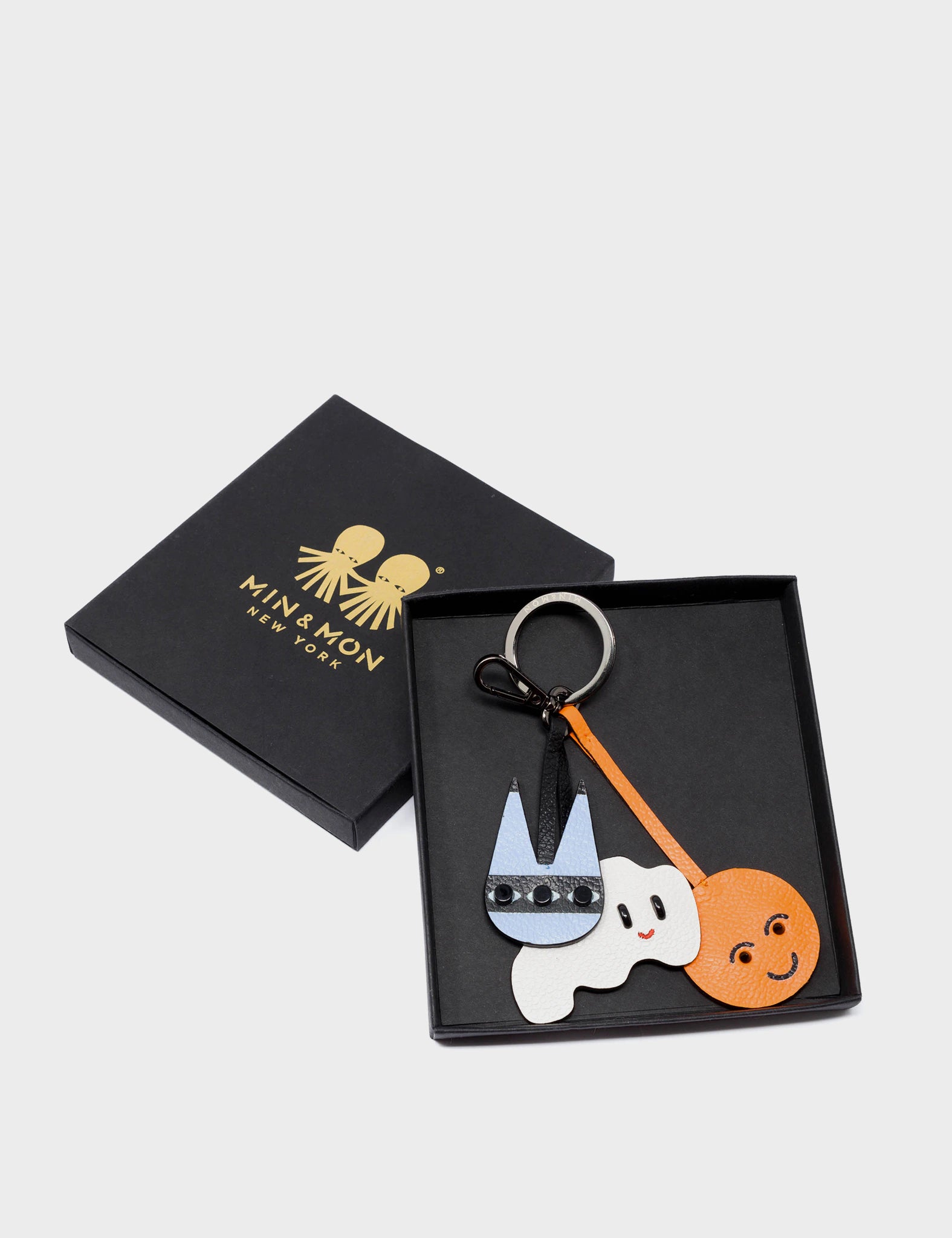 Cloudy Friends Charm - Winsurfer Blue and Lollipop Orange Leather Keychain - Packaging View