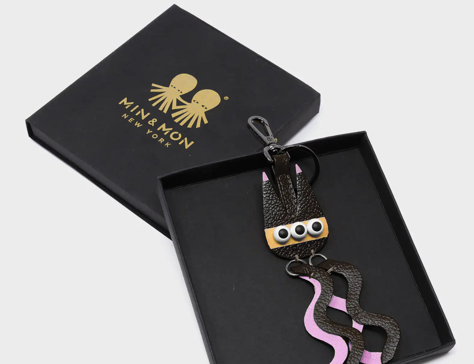 Cosmic Cat Charm - Black and Parfait Pink Leather Keychain - Package
