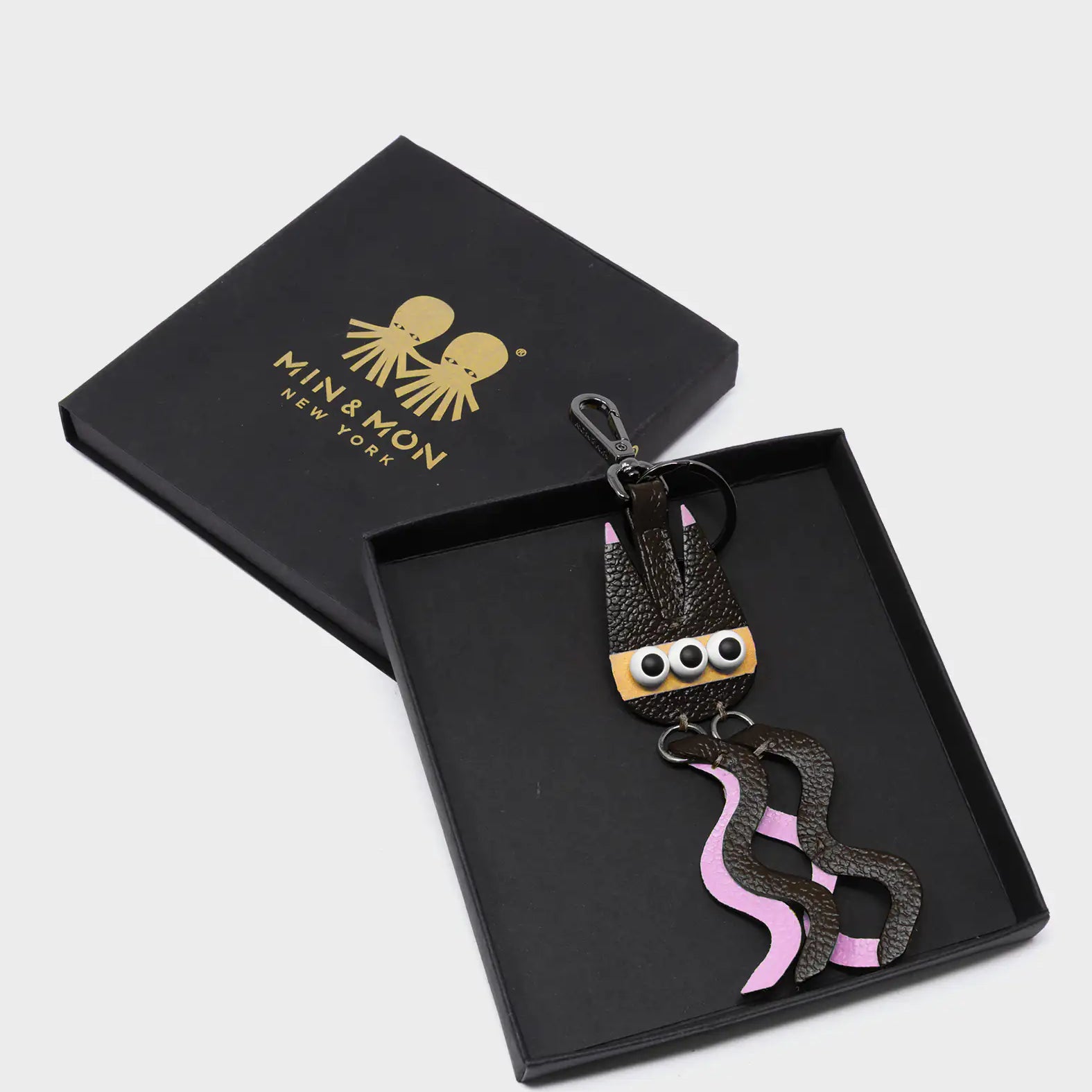 Cosmic Cat Charm - Black and Parfait Pink Leather Keychain - Package