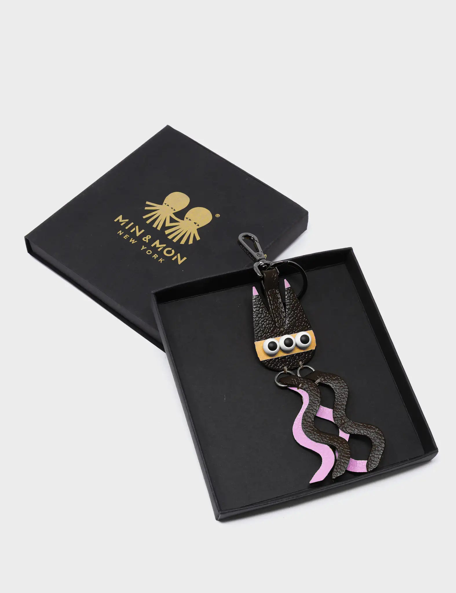 Cosmic Cat Charm - Black and Parfait Pink Leather Keychain - Package