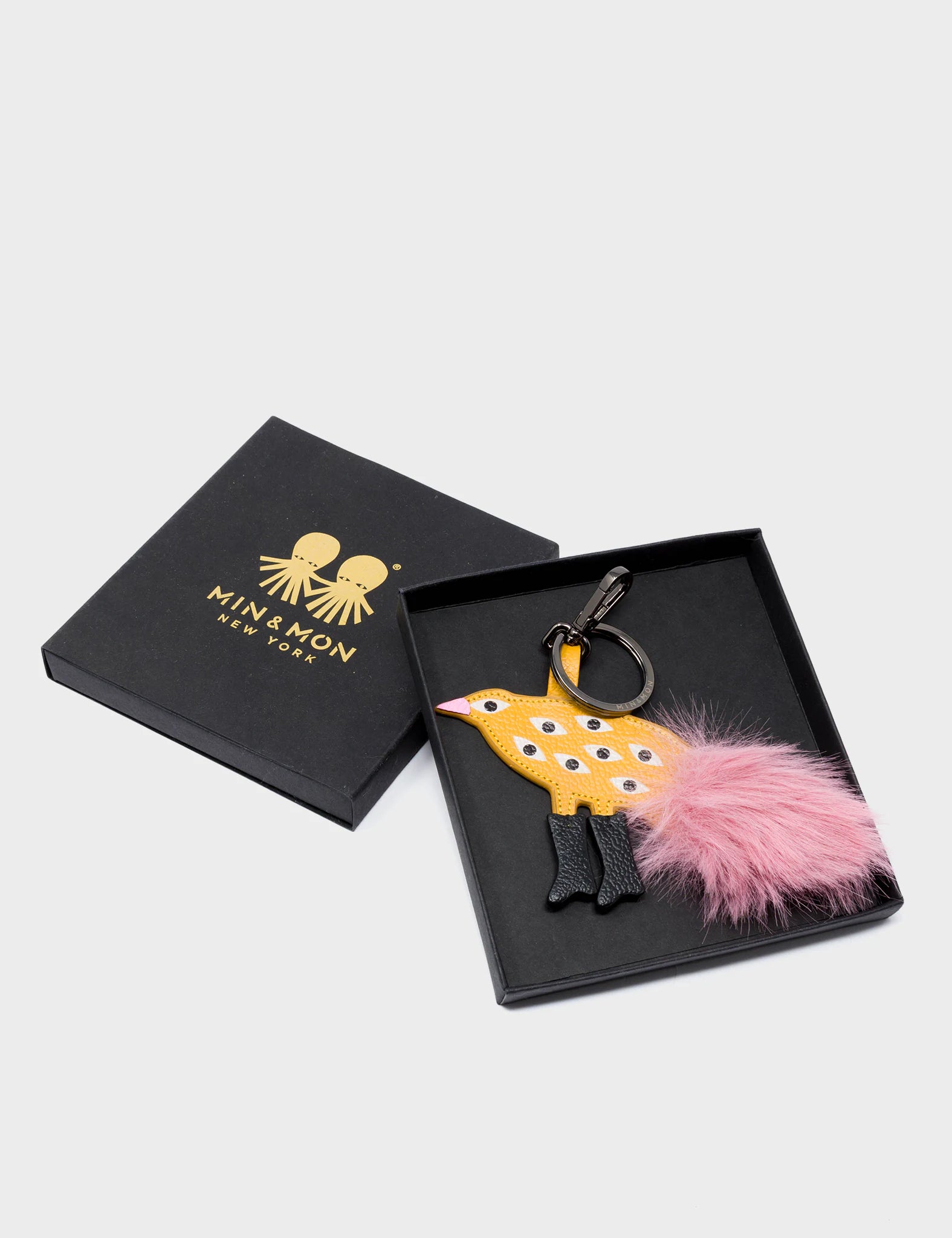 Bird In Boots Charm - Golden Glow Leather Keychain - Packaging View