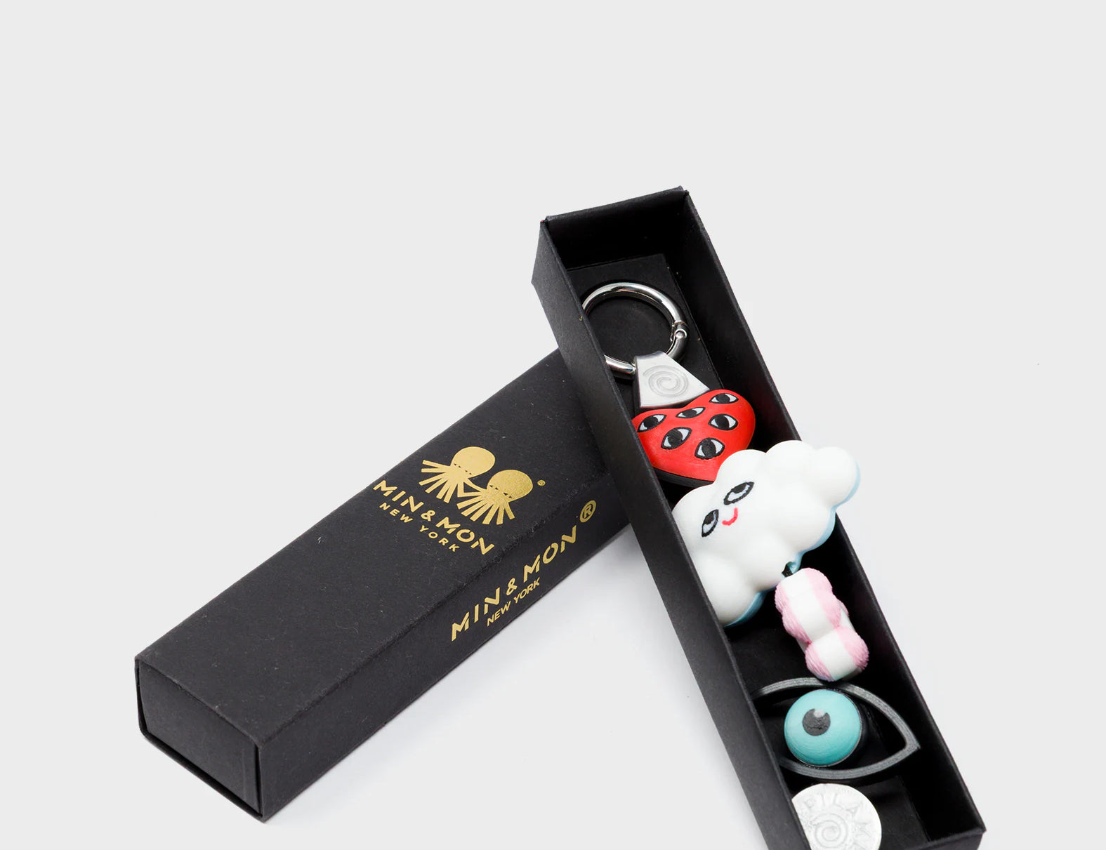 Cloudette Charm - Red and Pink 3D Printed Bioplastic Keychain - Package