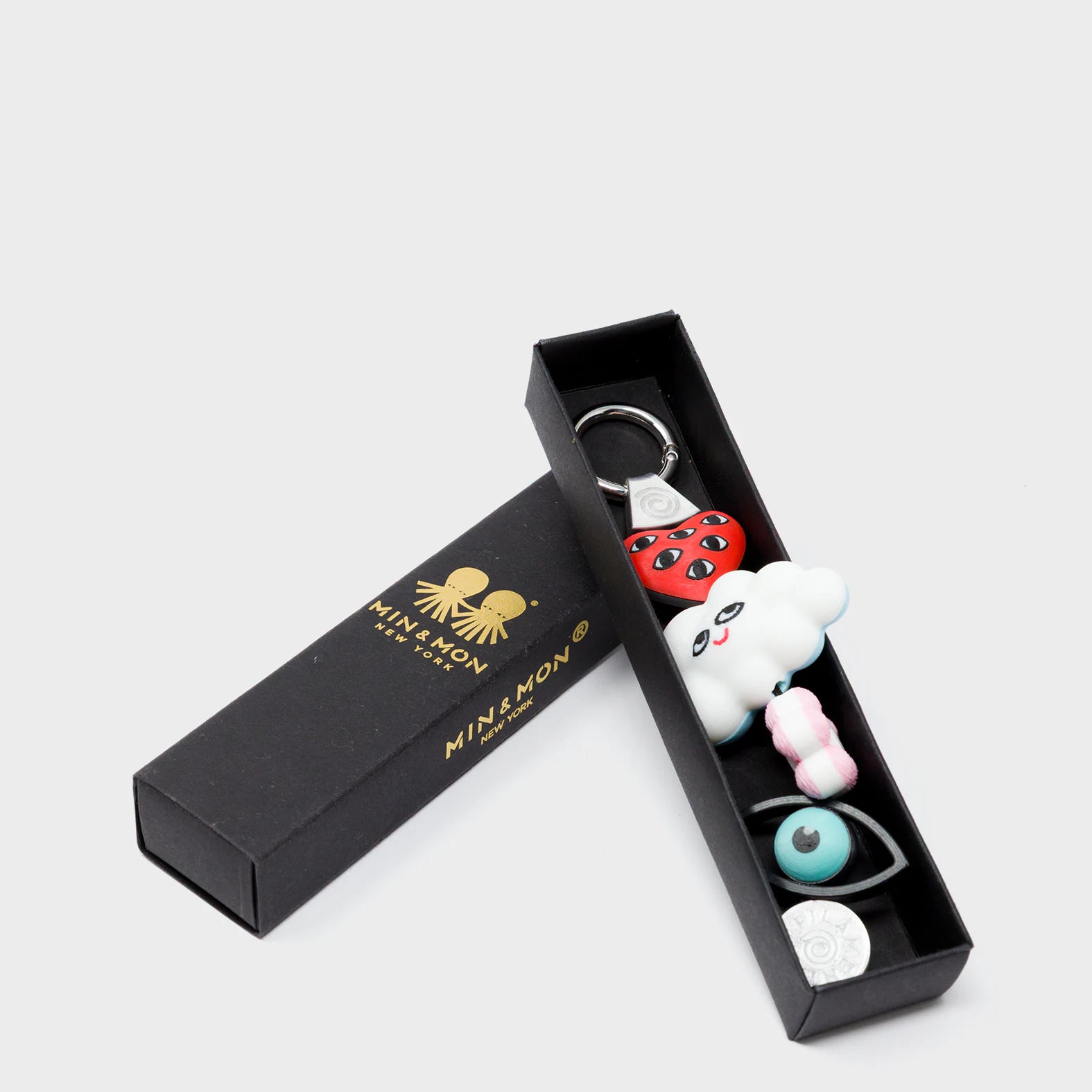 Cloudette Charm - Red and Pink 3D Printed Bioplastic Keychain - Package