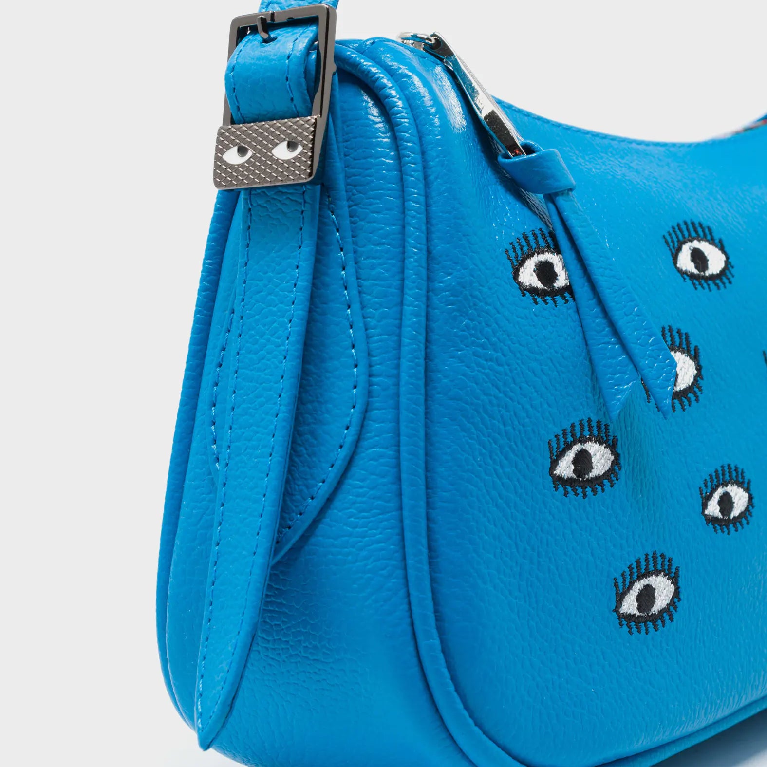 Lucas Hobo Mini Hawaii Blue Handbag - All Over Eyes Embroidery - Side Corner View