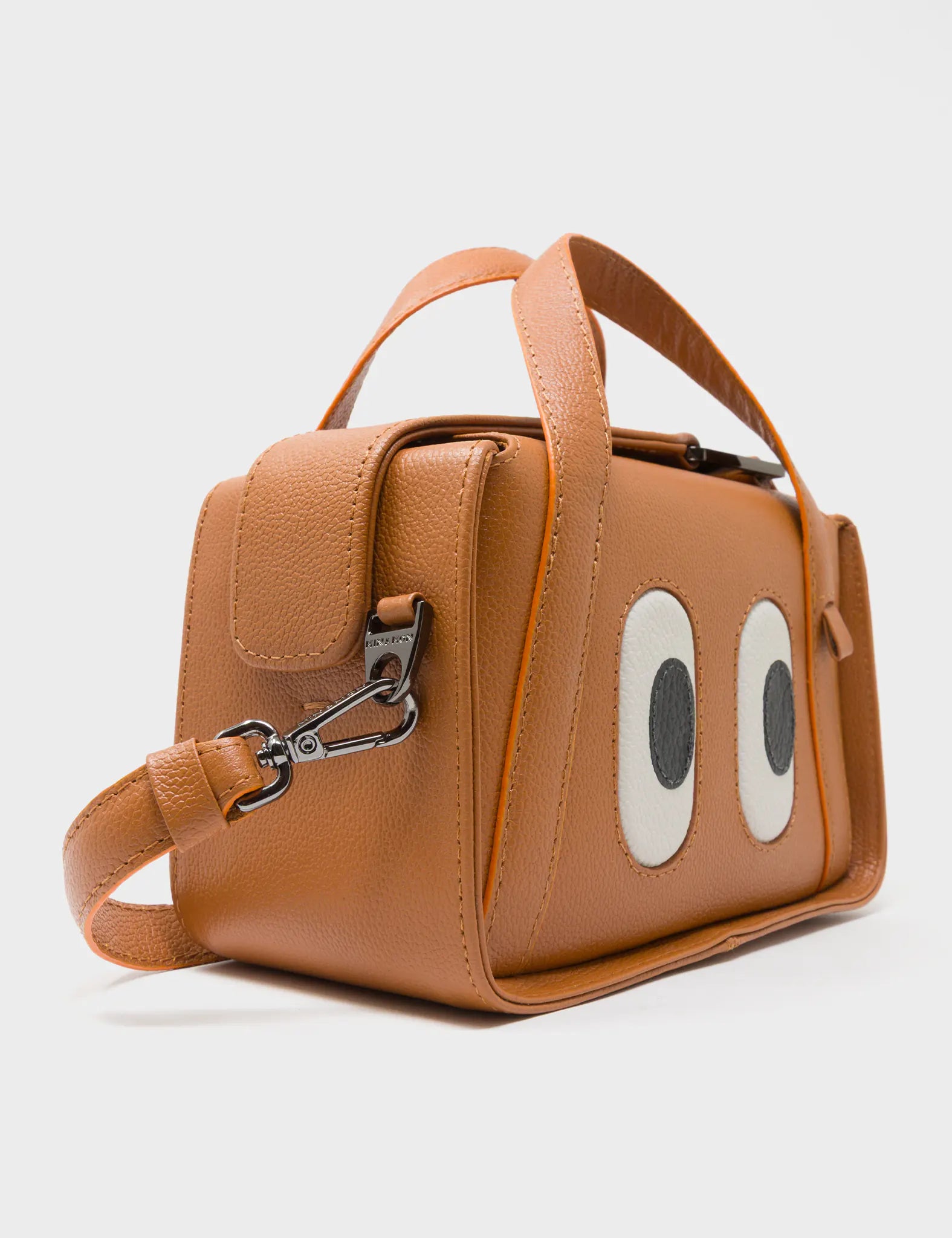 Benji Micro Crossbody Caramel Leather Bag - Eyes Engraved - Close Up