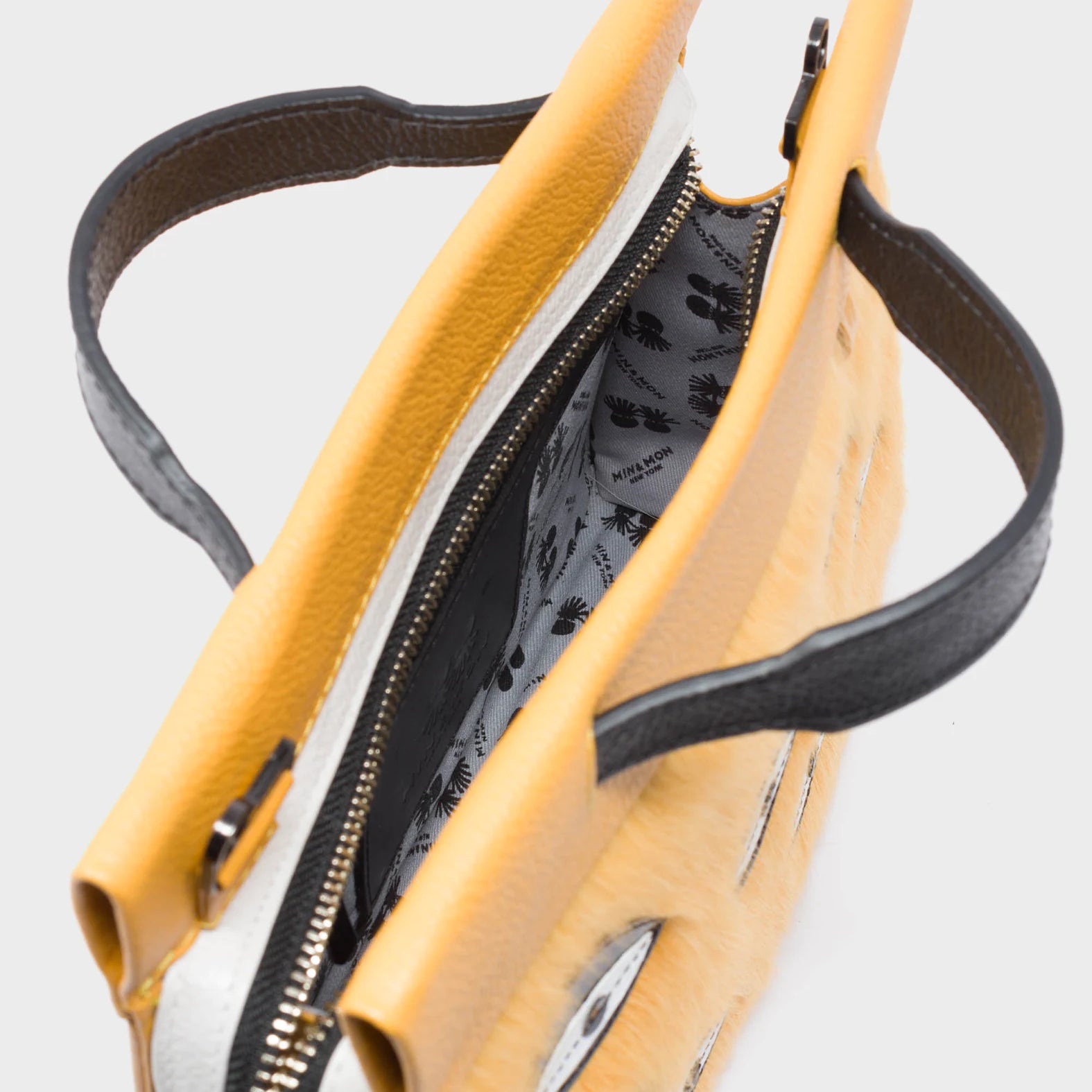 Vali Crossbody Small Golden And Black Leather Bag - Eyes Applique Adjustable Handle - Detail View