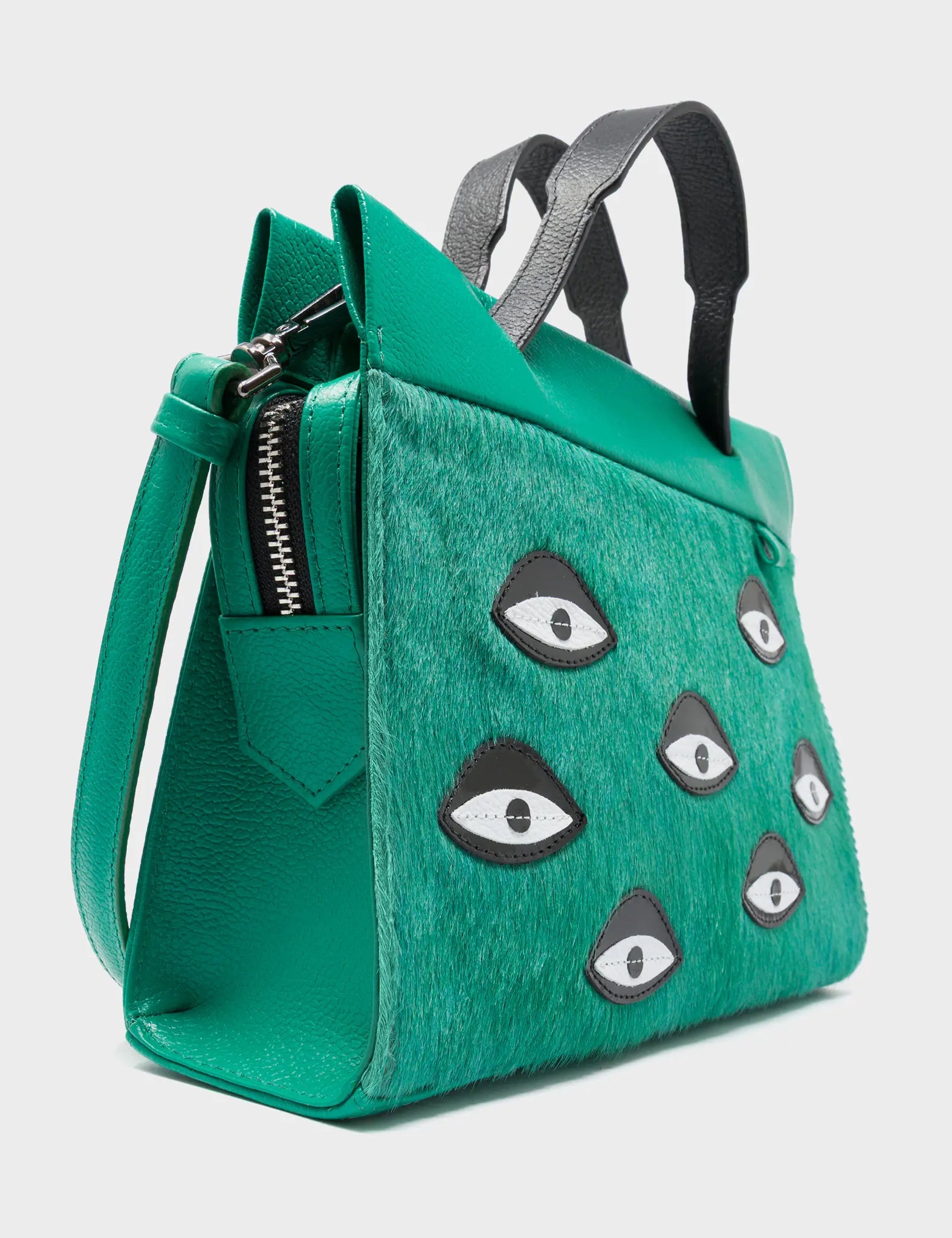 Vali Crossbody Small Deep Green Leather Bag - Eyes Applique Adjustable Handle - Side Corner View