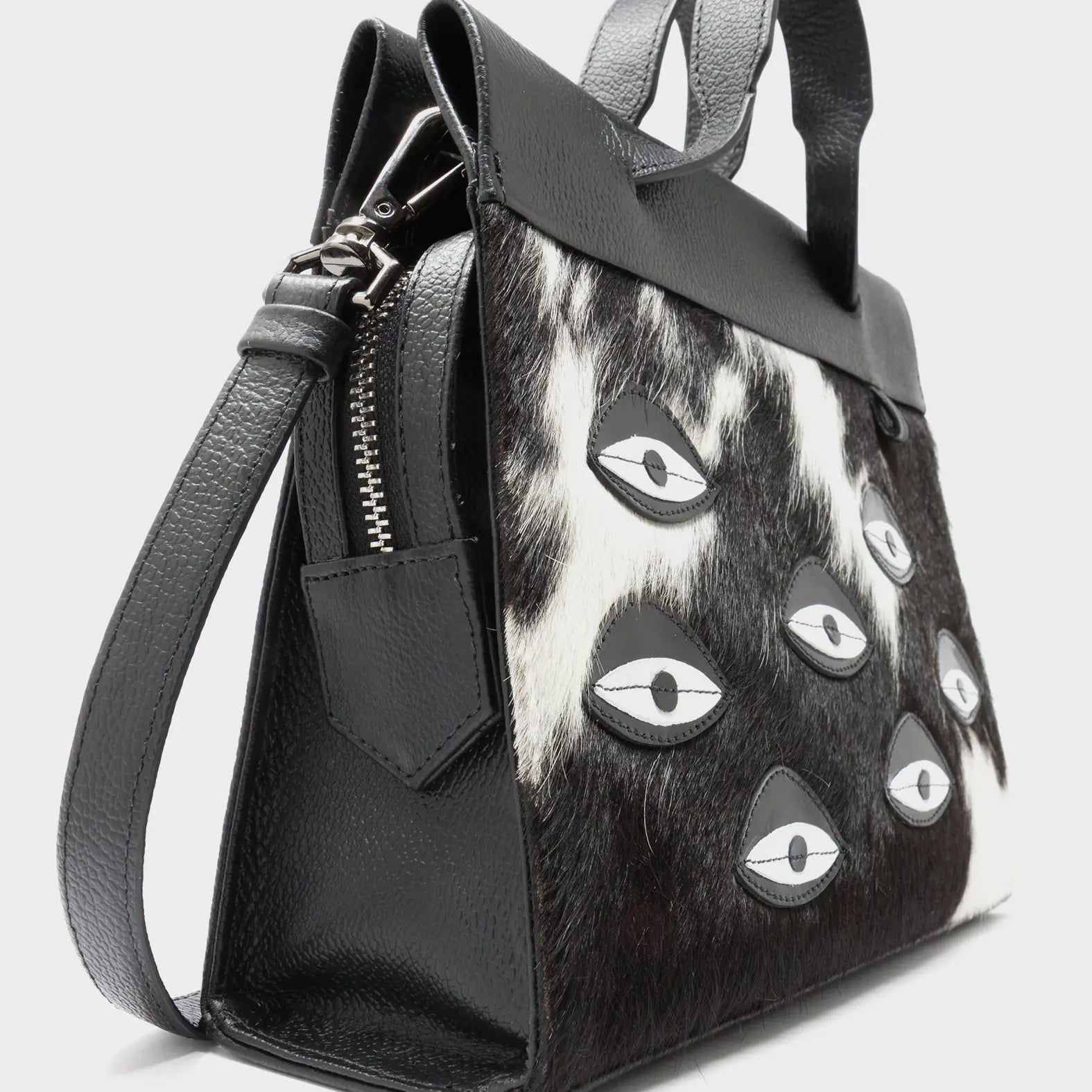 Vali Crossbody Small Black Leather Bag - Eyes Applique Adjustable Handle - Spotted Fur Side Corner View
