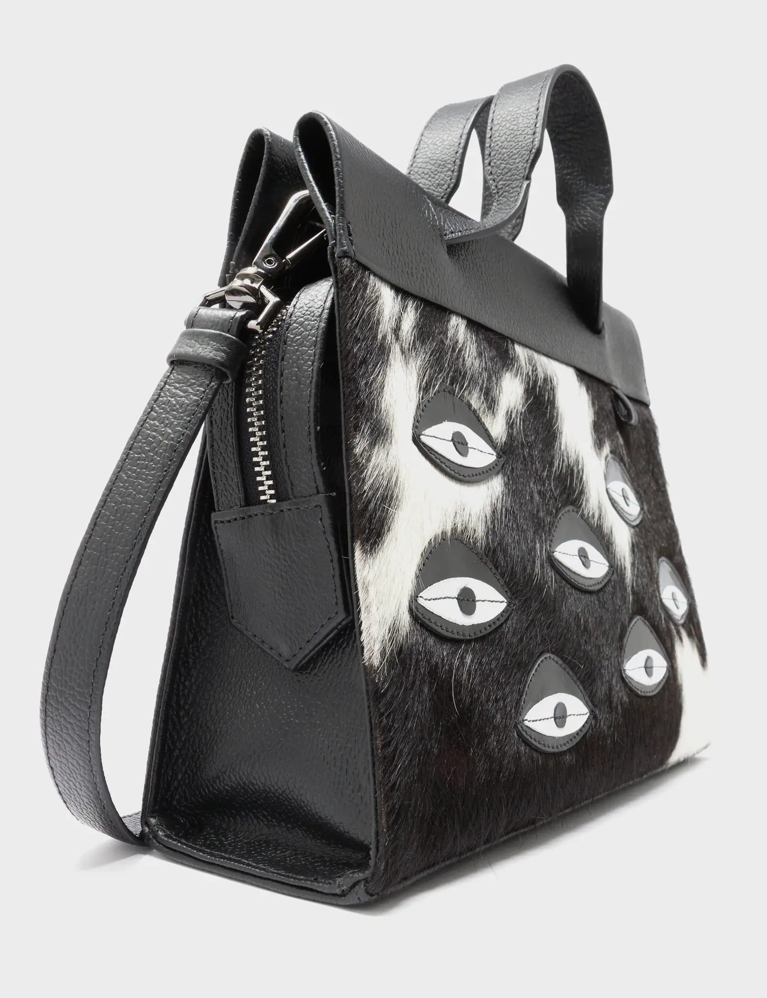 Vali Crossbody Small Black Leather Bag - Eyes Applique Adjustable Handle - Spotted Fur Side Corner View