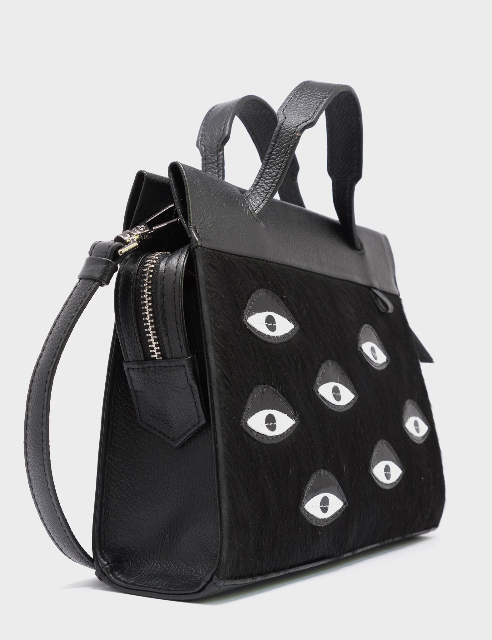 Vali Crossbody Small Black Leather Bag - Eyes Applique Adjustable Handle - Side Corner View