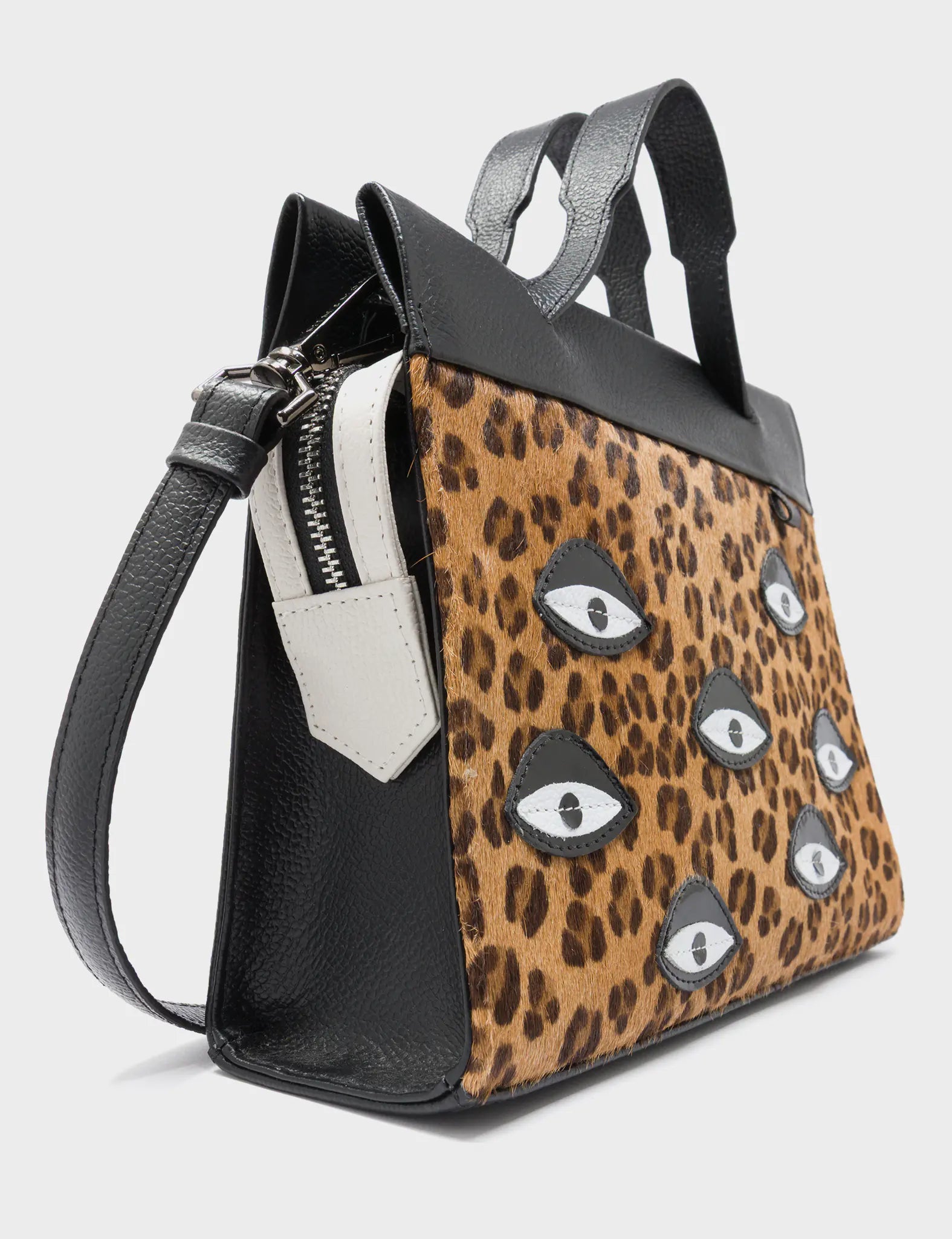 Vali Crossbody Small Animal Print Leather Bag - Eyes Applique Adjustable Handle - Side Corner View