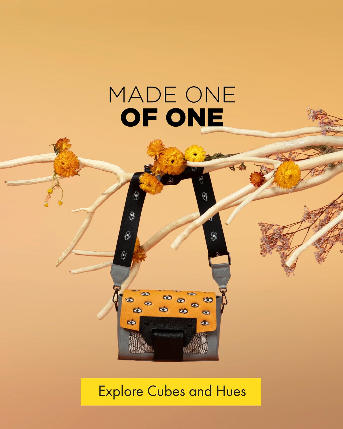 Min & Mon Cael crossbody bag from Cubes and Hues with orange eye-print leather, geometric details and signature eye strap.