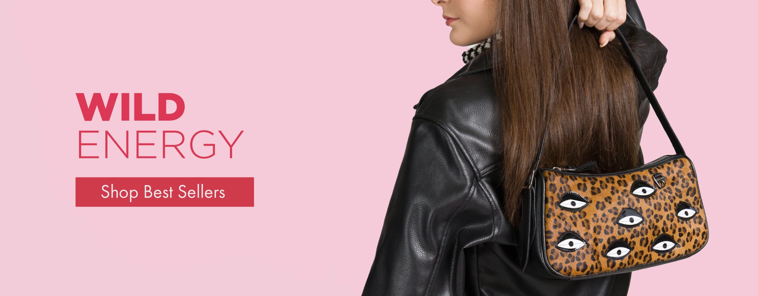 Woman wearing a black leather jacket carrying a leopard print Min & Mon shoulder bag with eye appliqués, text reads “Wild Energy” and “Shop Best Sellers.”