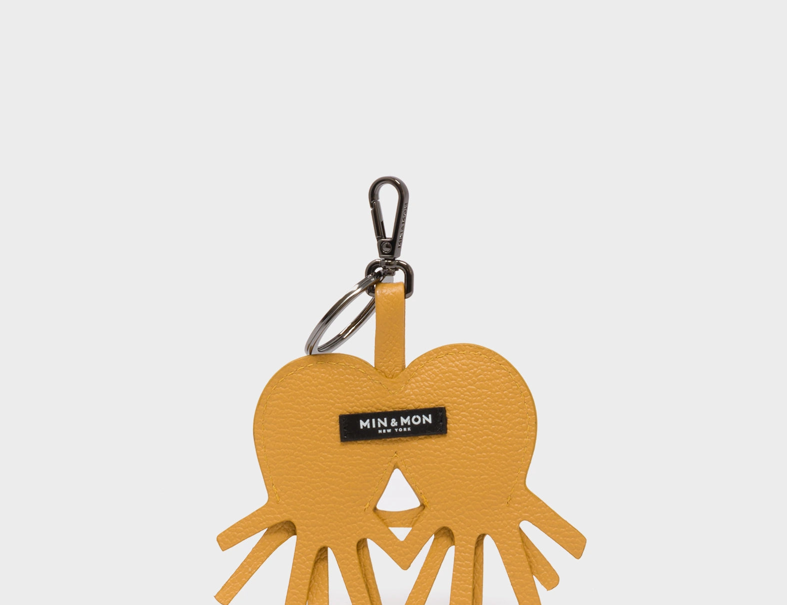 Octotwins Charm - Golden Glow Leather Keychain - Back View