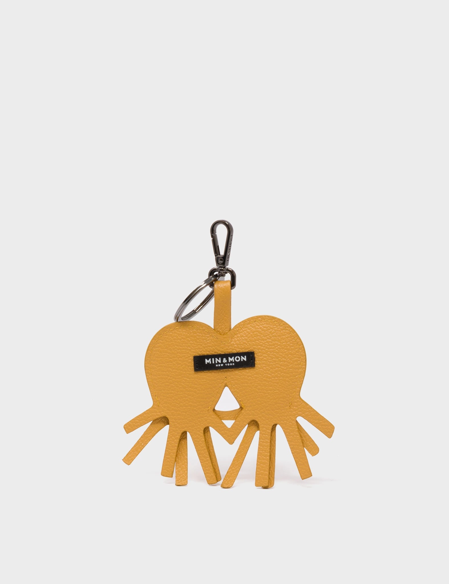 Octotwins Charm - Golden Glow Leather Keychain - Back View