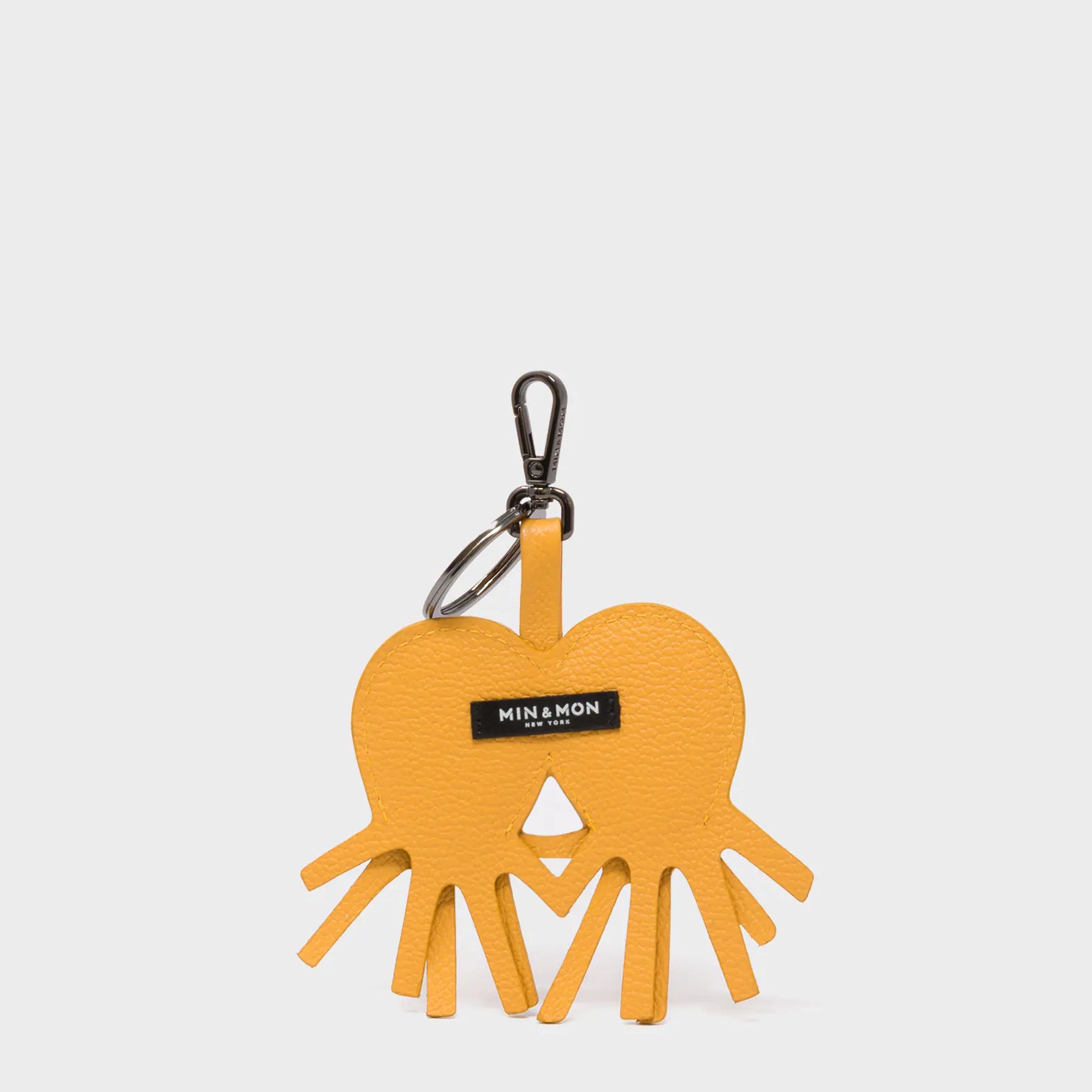 Octotwins Charm - Golden Glow Leather Keychain - Back View