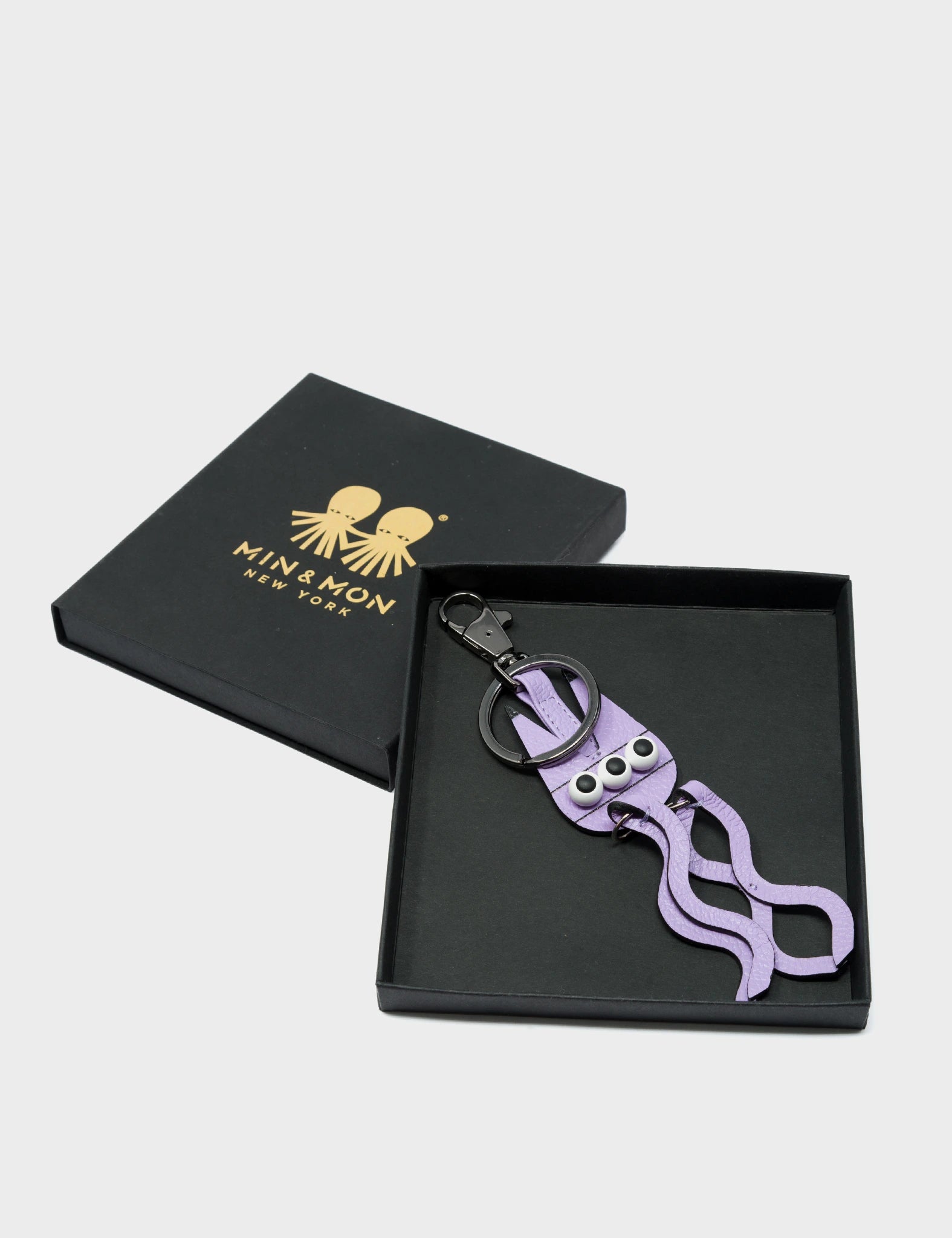 Cosmic Cat Charm - Lavender Leather Keychain - Packaging View