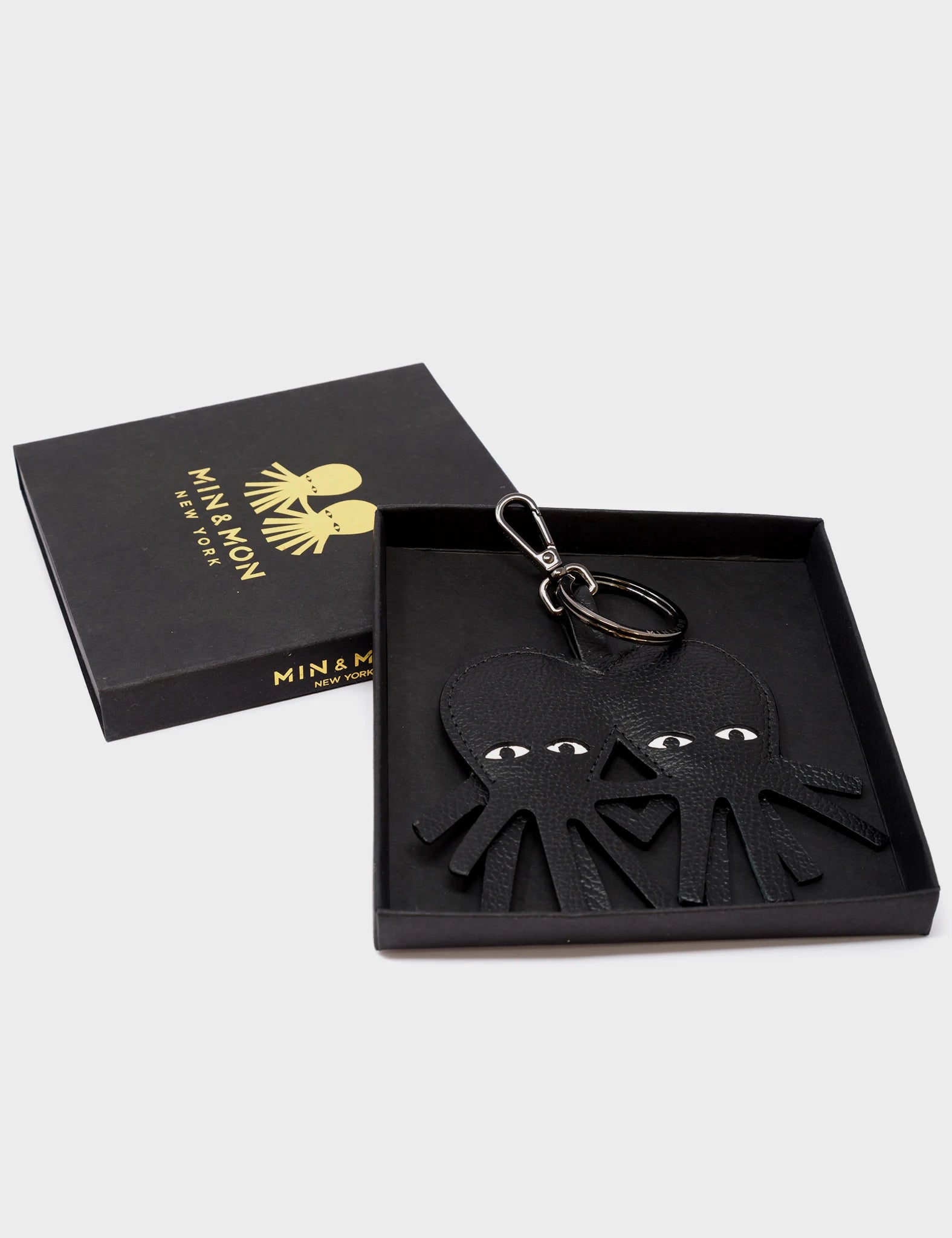 Octotwins Charm - Black Leather Keychain - Packaging View