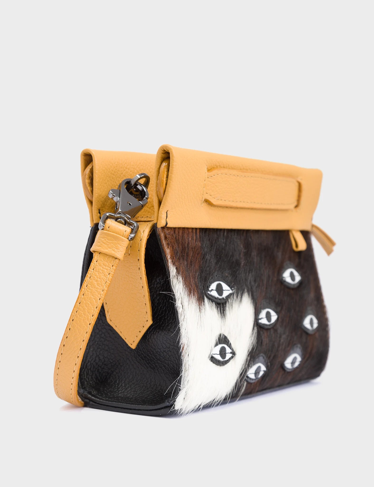 Vali Crossbody Micro Golden Glow and Black Leather Bag - Eyes Applique Adjustable Handle - Black Spotted Fur - Side Corner View