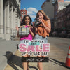 Women walking through New York City wearing and carrying Min & Mon handbags, smiling, exploring the city, and enjoying everyday moments together, with The Summer Edit Sale graphic showing up to 50% OFF.