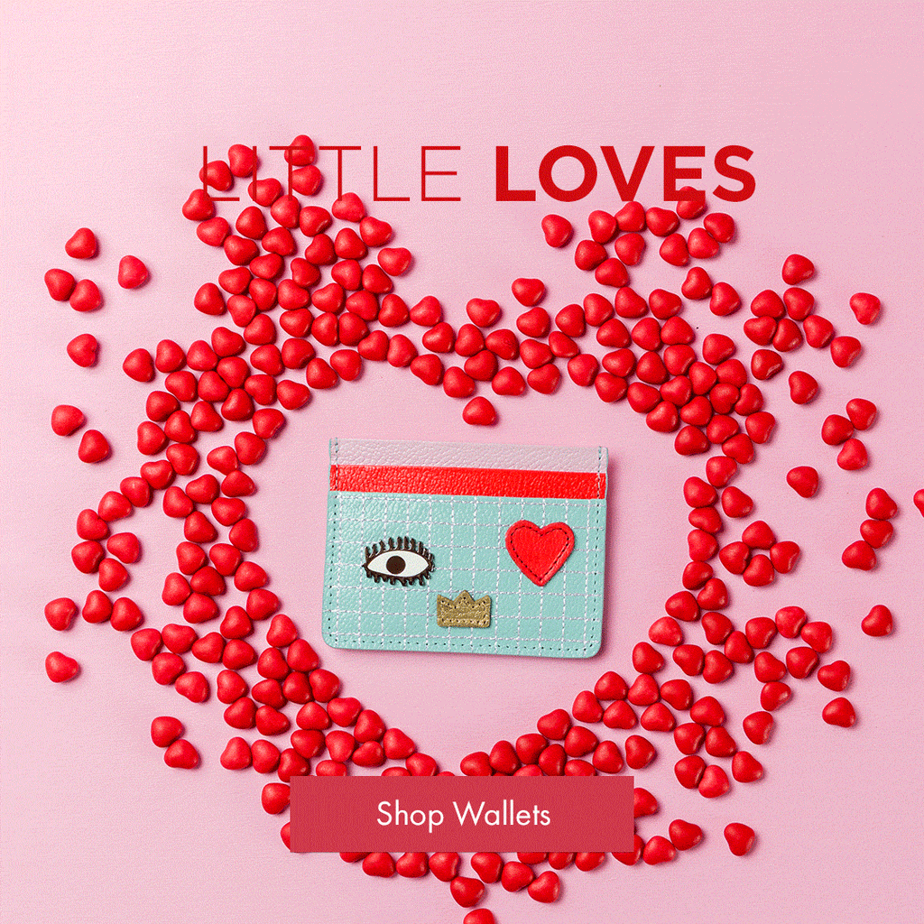 Animated image of a Min & Mon wallet surrounded by red heart shapes, highlighting small Valentine-inspired gifts.