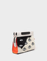 Vali Crossbody Small Black And Neon Orange Leather Bag - Eyes Applique Adjustable Handle - Front corner angle view