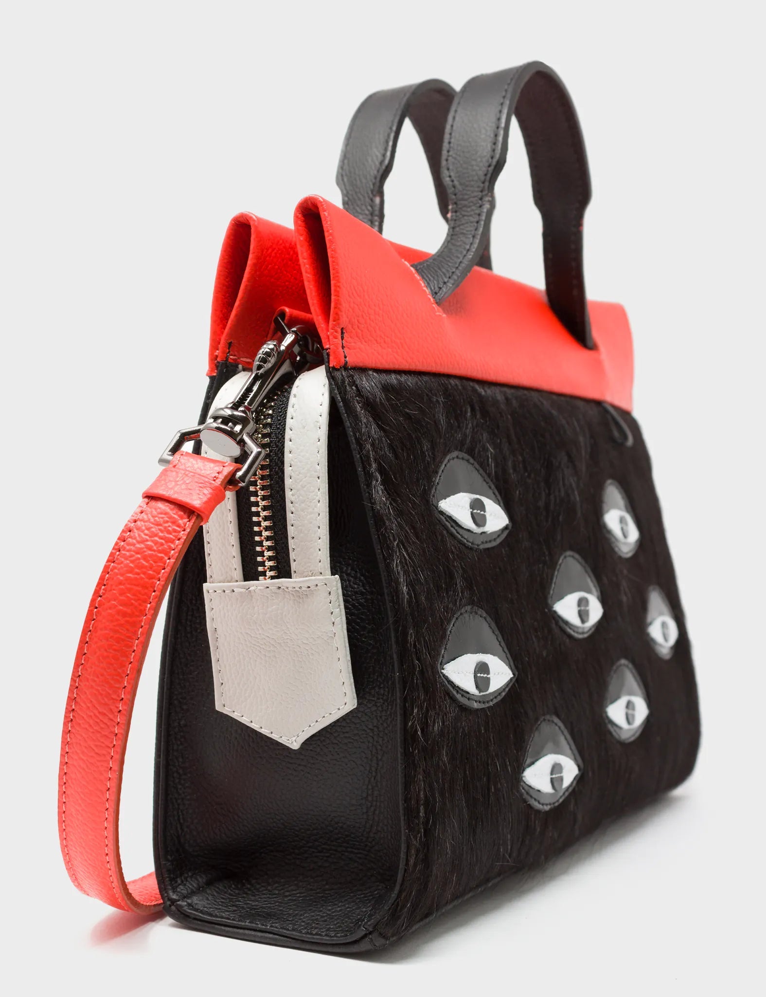 Vali Crossbody Small Black Leather Bag - Eyes Applique Adjustable Handle - Side view