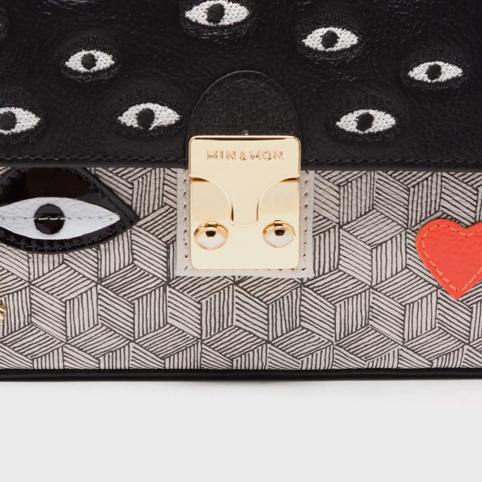 Amantis Crossbody Handbag - Black and Cream All Over Eyes Embroidery - Close up view