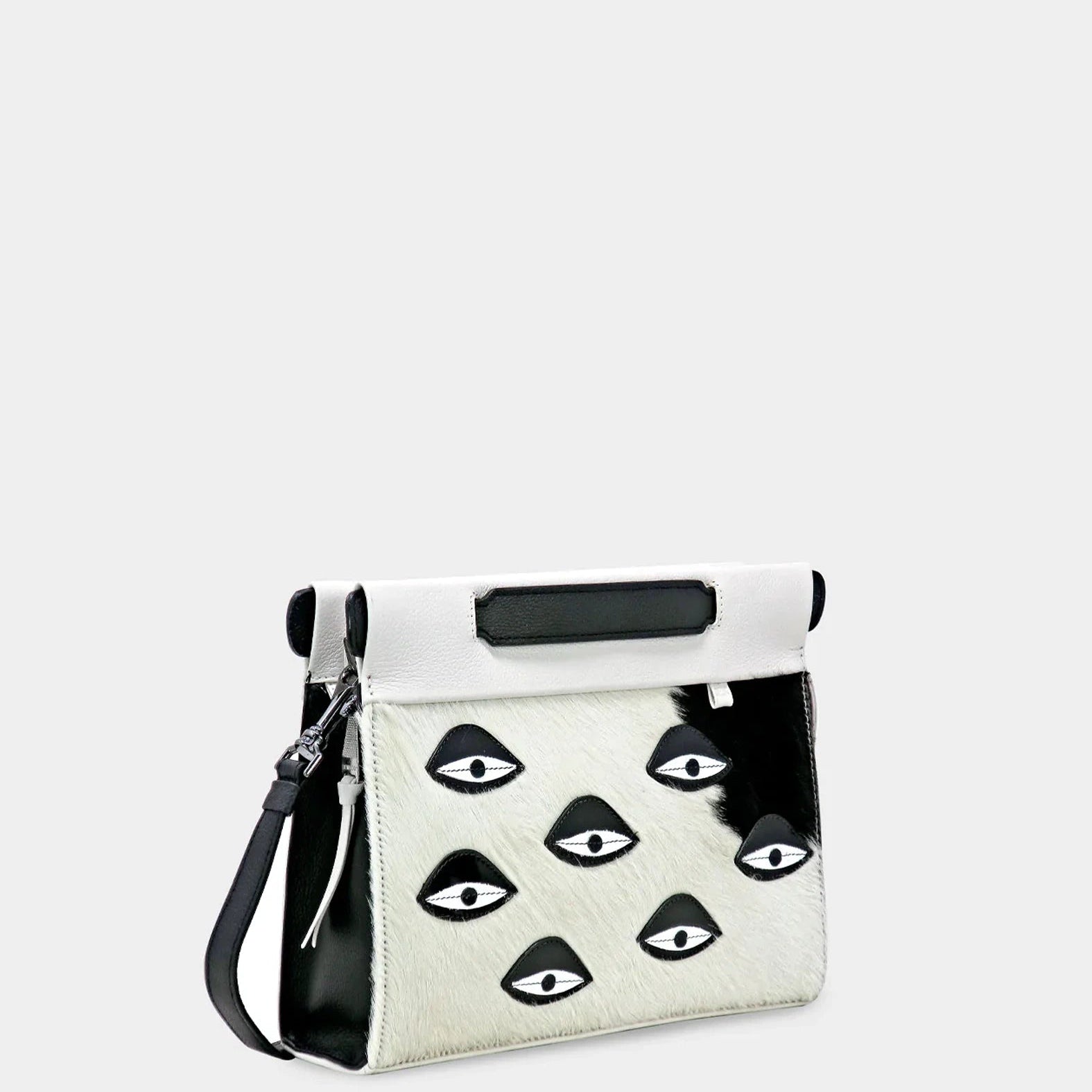 Vali Crossbody Small Cream Leather Bag - Eyes Applique Adjustable Handle - Front corner angle view
