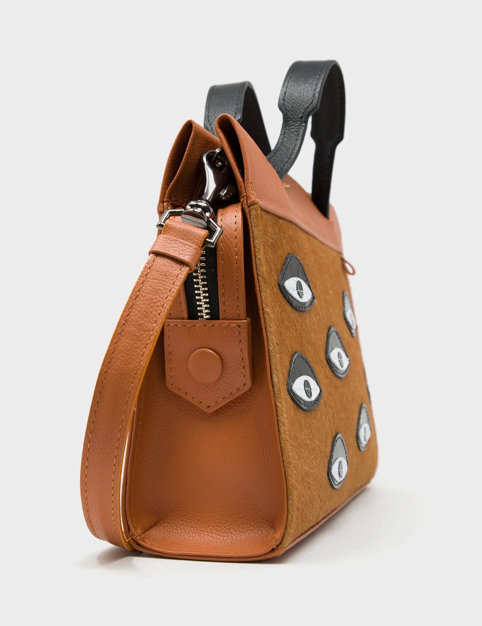 Vali Crossbody Small Caramel Leather Bag - Eyes Applique Adjustable Handle - Side view